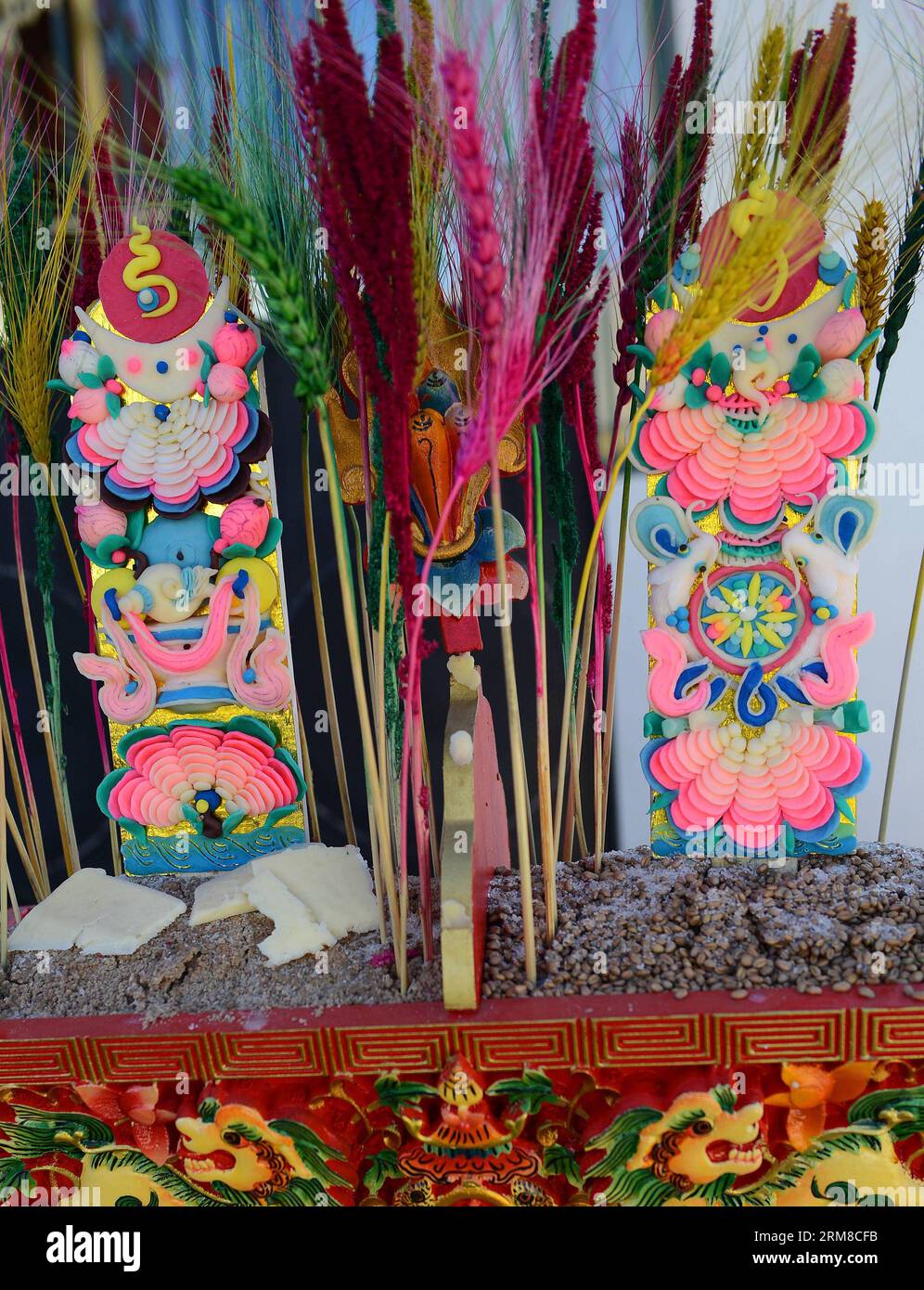 LHASA,  2014 - Photo taken on March 27, 2014 shows butter sculptures in Kangxung Township of Rinbung County in Shigatse, southwest China s Tibet Autonomous Region. There are about 100 butter sculpture craftsmen in Kangxung because of the growing need in market. Butter Sculpture is an ancient and unique genre of art in Tibet whitch was listed as a national intangible cultural heritage by the State Council in 2006. (Xinhua/Chogo) (zkr) CHINA-SHIGATSE-BUTTER SCULPTURE(CN) PUBLICATIONxNOTxINxCHN   Lhasa 2014 Photo Taken ON March 27 2014 Shows Butter Sculptures in  Township of Rinbung County in Shi Stock Photo