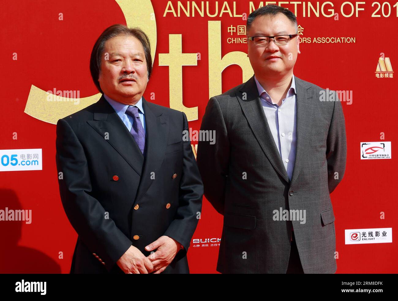 BEIJING,   Teng Wenji (L) and Teng Huatao take part in the 2013 annual commendation conference of China Film Directors Guild in Beijing, capital of China, April 9, 2014. (Xinhua) (zwy) CHINA-BEIJING-COMMENDATION CONFERENCE-CHINA FILM DIRECTORS GUILD(CN) PUBLICATIONxNOTxINxCHN   Beijing Teng Wenji l and Teng  Take Part in The 2013 Annual  Conference of China Film Directors Guild in Beijing Capital of China April 9 2014 XINHUA  China Beijing  Conference China Film Directors Guild CN PUBLICATIONxNOTxINxCHN Stock Photo