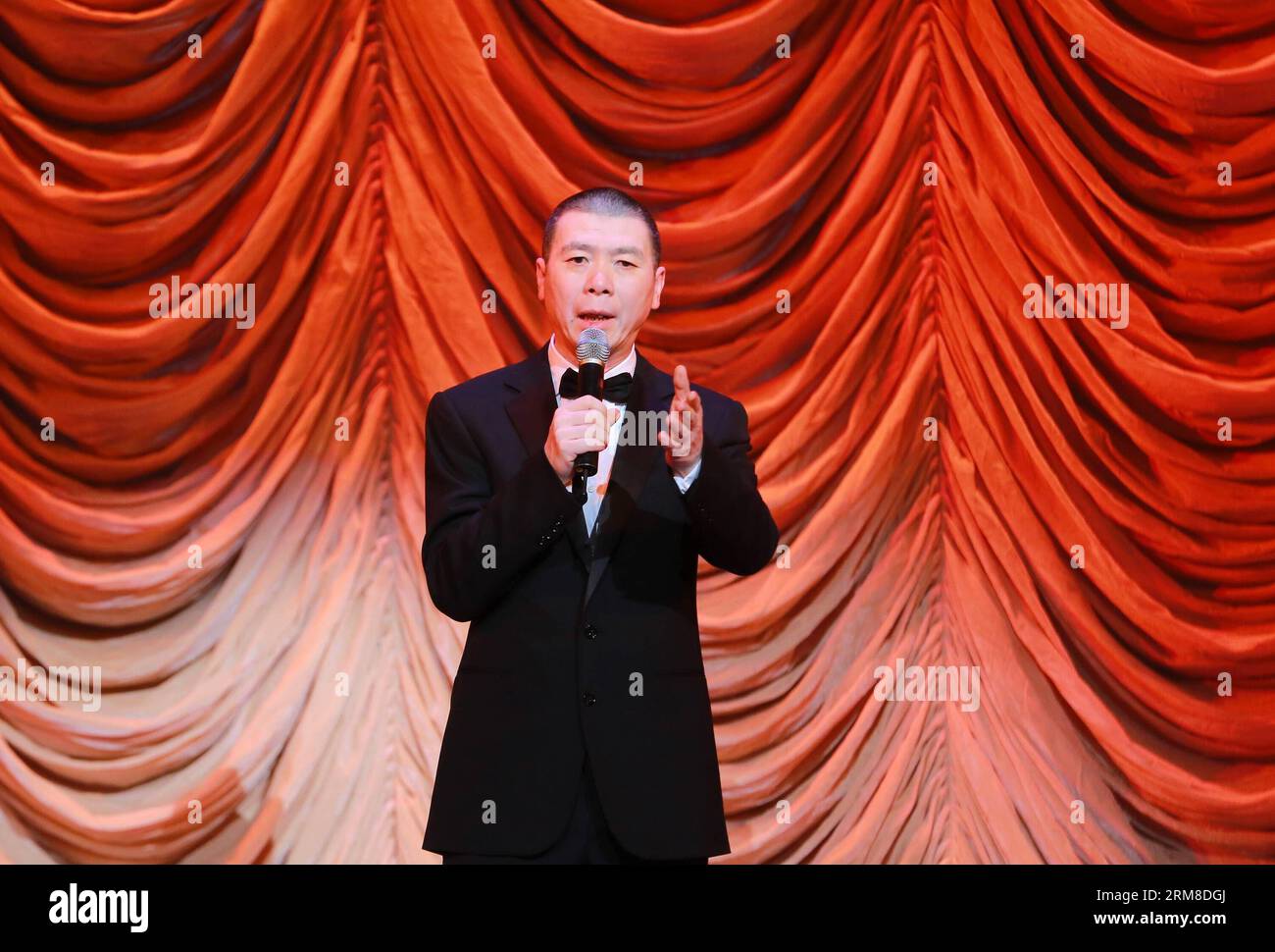 Director Feng Xiaogang acts as the chairman of the jury at the 2013 annual commendation conference of China Film Directors Guild in Beijing, capital of China, April 9, 2014. (Xinhua) (zwy) CHINA-BEIJING-COMMENDATION CONFERENCE-CHINA FILM DIRECTORS GUILD(CN) PUBLICATIONxNOTxINxCHN   Director Feng Xiaogang Acts As The Chairman of The Jury AT The 2013 Annual  Conference of China Film Directors Guild in Beijing Capital of China April 9 2014 XINHUA  China Beijing  Conference China Film Directors Guild CN PUBLICATIONxNOTxINxCHN Stock Photo