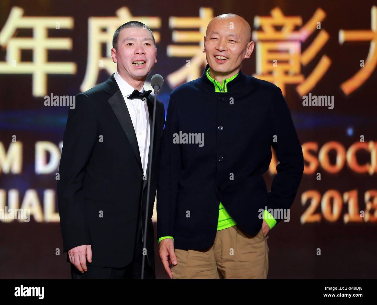 Director Feng Xiaogang and actor Ge You take part in the 2013 annual commendation conference of China Film Directors Guild in Beijing, capital of China, April 9, 2014. (Xinhua) (zwy) CHINA-BEIJING-COMMENDATION CONFERENCE-CHINA FILM DIRECTORS GUILD(CN) PUBLICATIONxNOTxINxCHN   Director Feng Xiaogang and Actor GE You Take Part in The 2013 Annual  Conference of China Film Directors Guild in Beijing Capital of China April 9 2014 XINHUA  China Beijing  Conference China Film Directors Guild CN PUBLICATIONxNOTxINxCHN Stock Photo