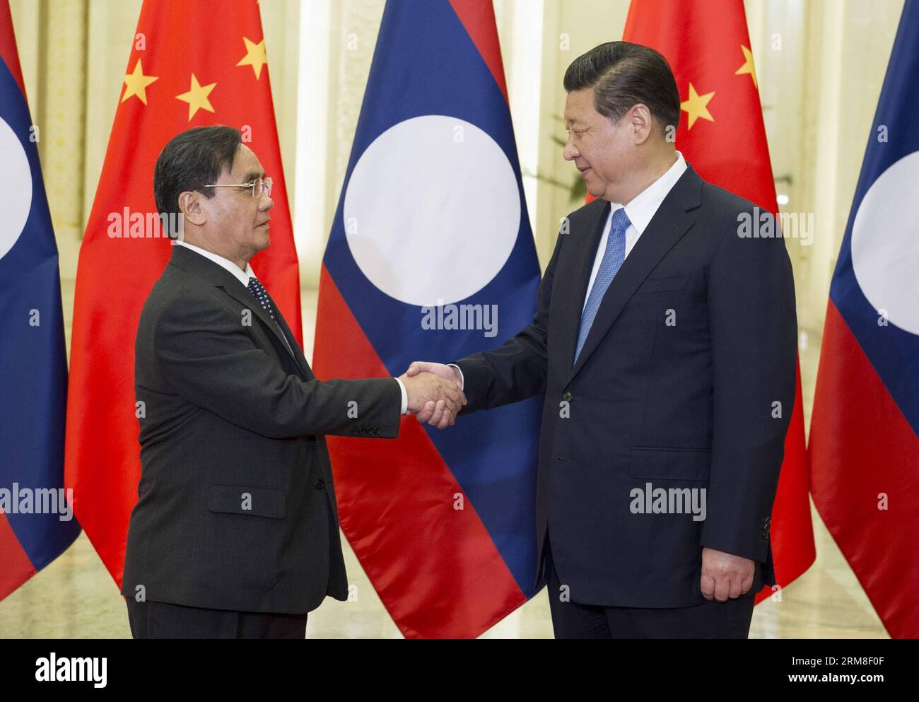 (140411) -- BEIJING, April 11, 2014 (Xinhua) -- Chinese President Xi Jinping (R) meets with visiting Prime Minister of Laos Thongsing Thammavong in Beijing, capital of China, April 11, 2014. (Xinhua/Huang Jingwen) (zkr) CHINA-BEIJING-XI JINPING-LAOS-THONGSING-MEETING (CN) PUBLICATIONxNOTxINxCHN   Beijing April 11 2014 XINHUA Chinese President Xi Jinping r Meets With Visiting Prime Ministers of Laos Sing Thong Thammavong in Beijing Capital of China April 11 2014 XINHUA Huang Jingwen CCR China Beijing Xi Jinping Laos Sing Thong Meeting CN PUBLICATIONxNOTxINxCHN Stock Photo