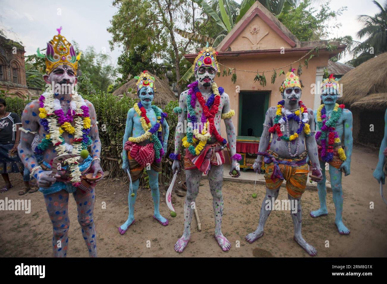 Indian Hindu devotees perform rituals during the Shiva Gajan Festival in  Sona Palashi, a remote village some 140 kilometres west of Calcutta,  capital of eastern Indian state West Bengal, on April 12,