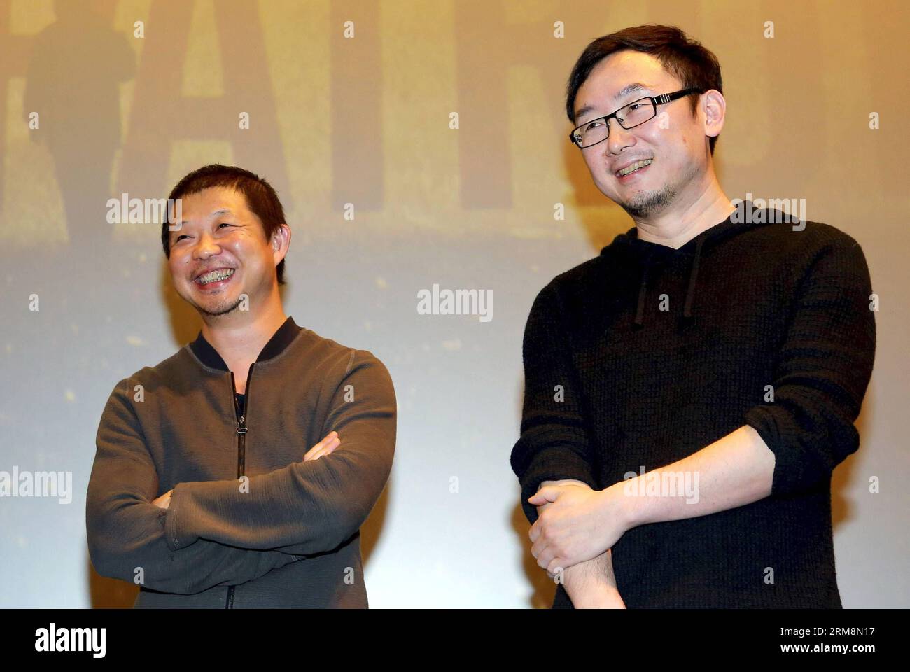 Photographer Cao Yu(L) and director Lu Chuan(R) attend the 10th anniversary activity of film Mountain Patrol in Beijing, capital of China, April 20, 2014. Film Mountain Patrol , directed by Lu Chuan, was screened in China on Oct. 1, 2004. (Xinhua) (zwy) CHINA-BEIJING-FILM MOUNTAIN PATROL-TENTH ANNIVERSARY(CN) PUBLICATIONxNOTxINxCHN   Photo Cao Yu l and Director Lu Chuan r attend The 10th Anniversary Activity of Film Mountain Patrol in Beijing Capital of China April 20 2014 Film Mountain Patrol Directed by Lu Chuan what screened in China ON OCT 1 2004 XINHUA  China Beijing Film Mountain Patrol Stock Photo