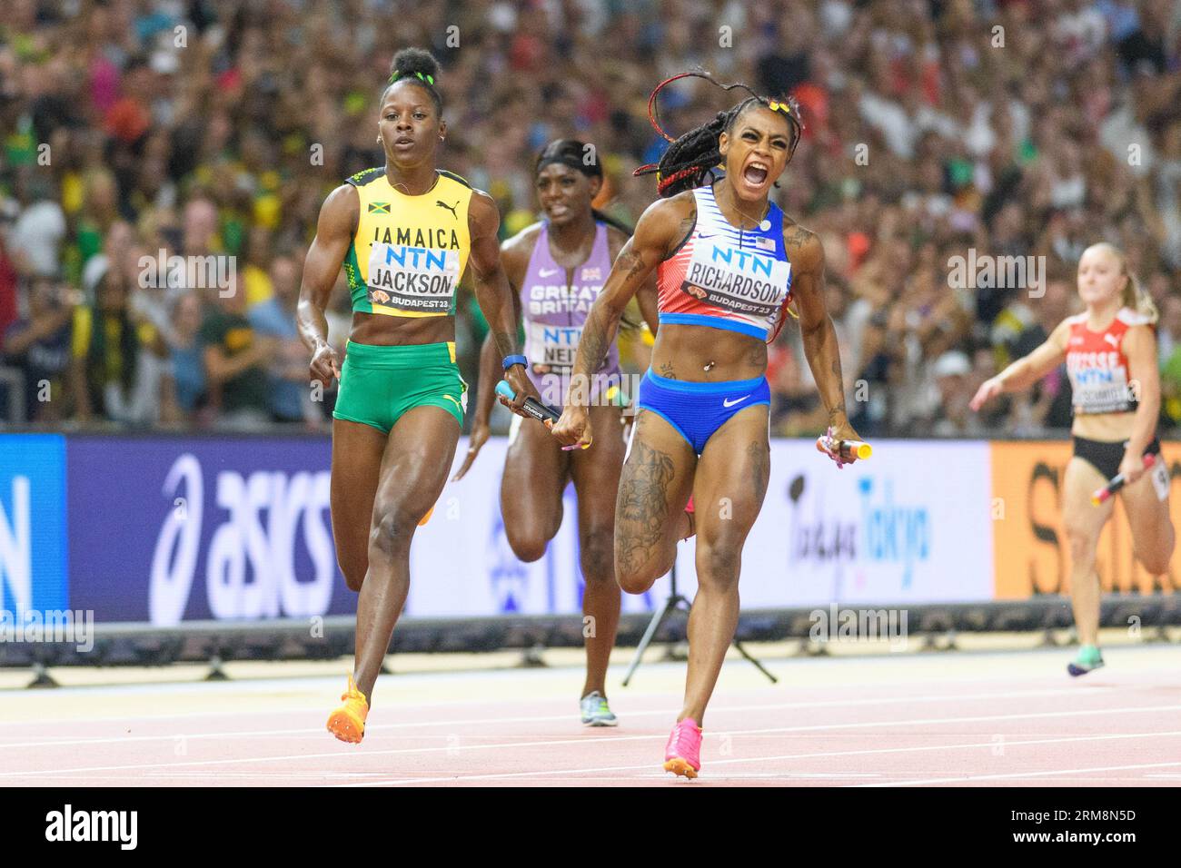 August 26, 2023: ShaCarrie Richardson (USA) celebrating while crossing