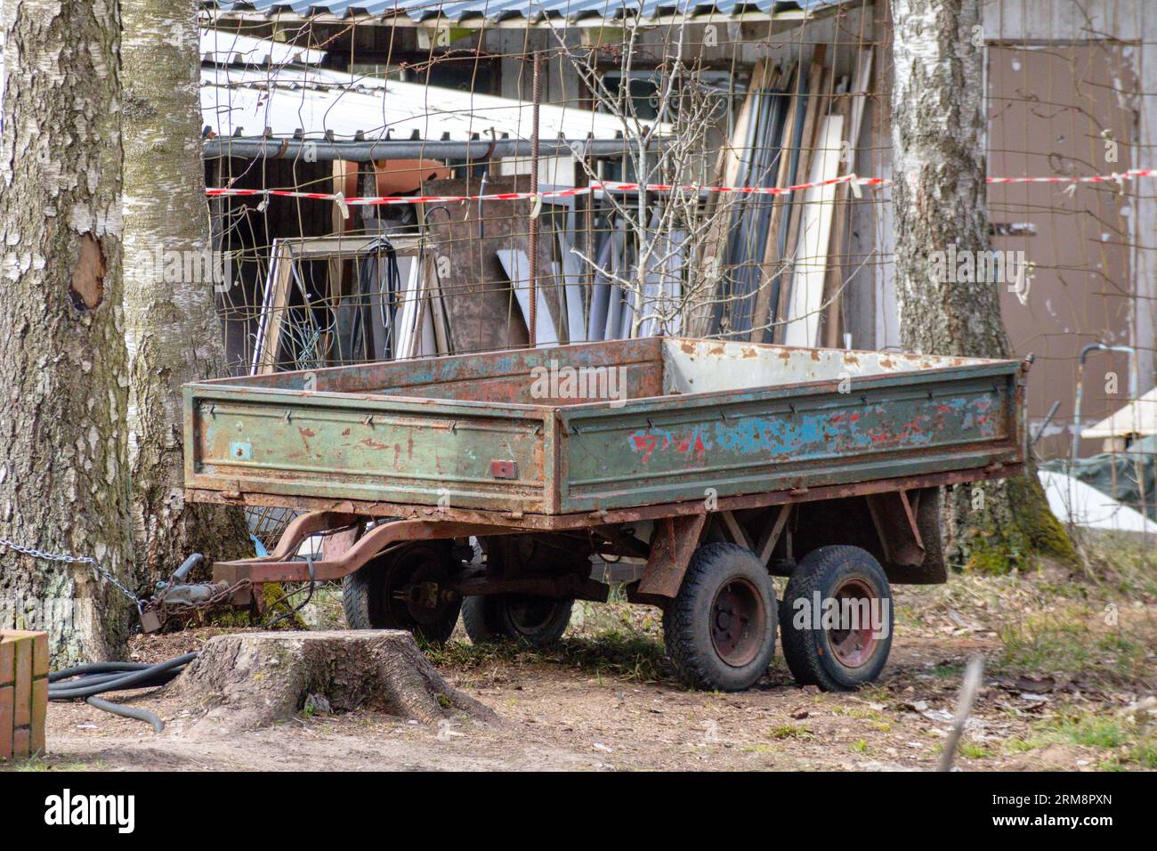 old tractor trailer in the forest Stock Photo