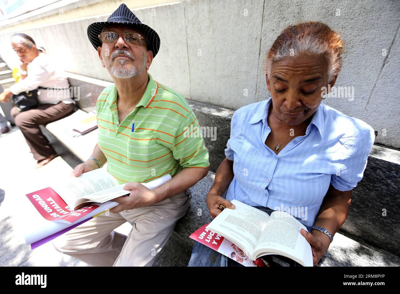 CARACAS, April 23, 2014 (Xinhua) -- People read books at Bolivar Square in Caracas, Venezuela, on April 23, 2014. The World Book Day is commemorated on Wednesday. (Xinhua/Zurimar Campos/AVN) (dzl) VENEZUELA-CARACAS-CULTURE-BOOK DAY PUBLICATIONxNOTxINxCHN   Caracas April 23 2014 XINHUA Celebrities Read Books AT Bolivar Square in Caracas Venezuela ON April 23 2014 The World Book Day IS commemorated ON Wednesday XINHUA  Campos  dzl Venezuela Caracas Culture Book Day PUBLICATIONxNOTxINxCHN Stock Photo
