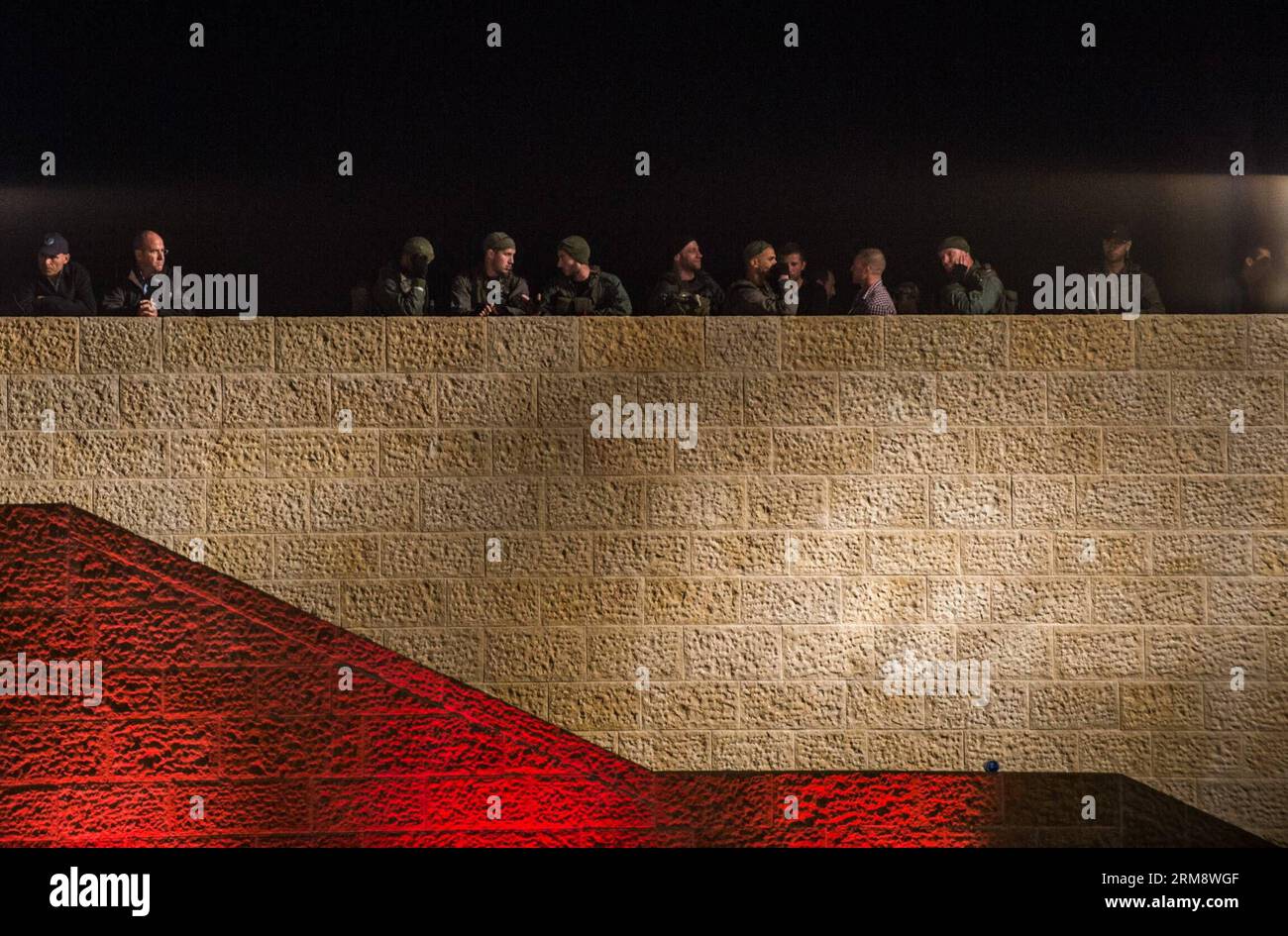 People attend the annual ceremony marking Holocaust Remembrance Day at ...