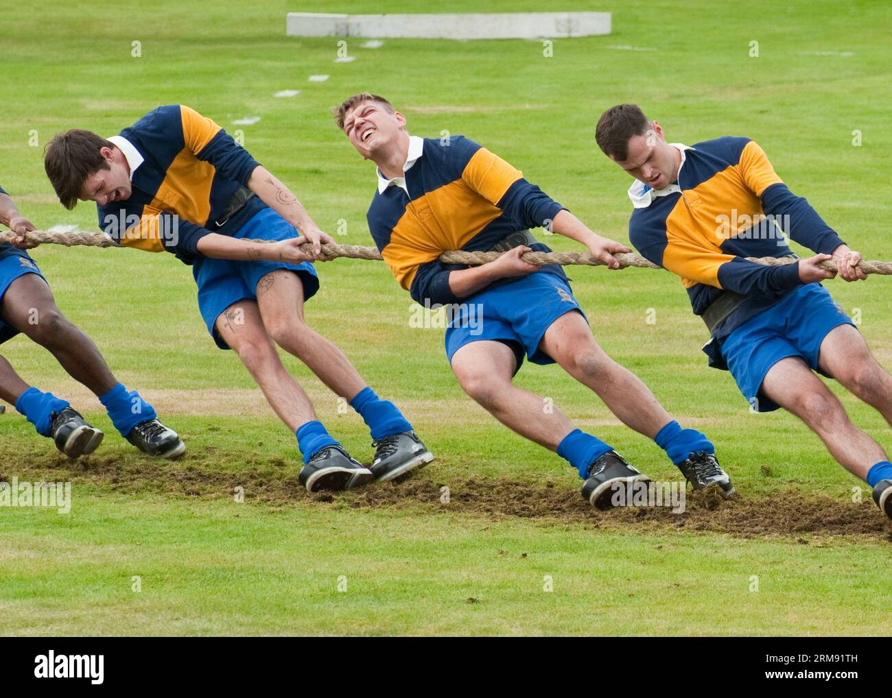 Tug of War team competing at the Braemar Highland Games, Aberddeenshire. Scotland Stock Photo
