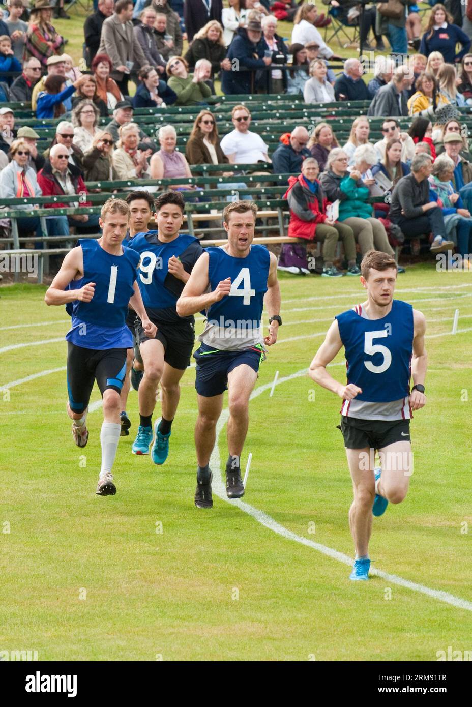 Runners competing at the Braemar Gathering, Highland Games. Aberdeenshire. Stock Photo