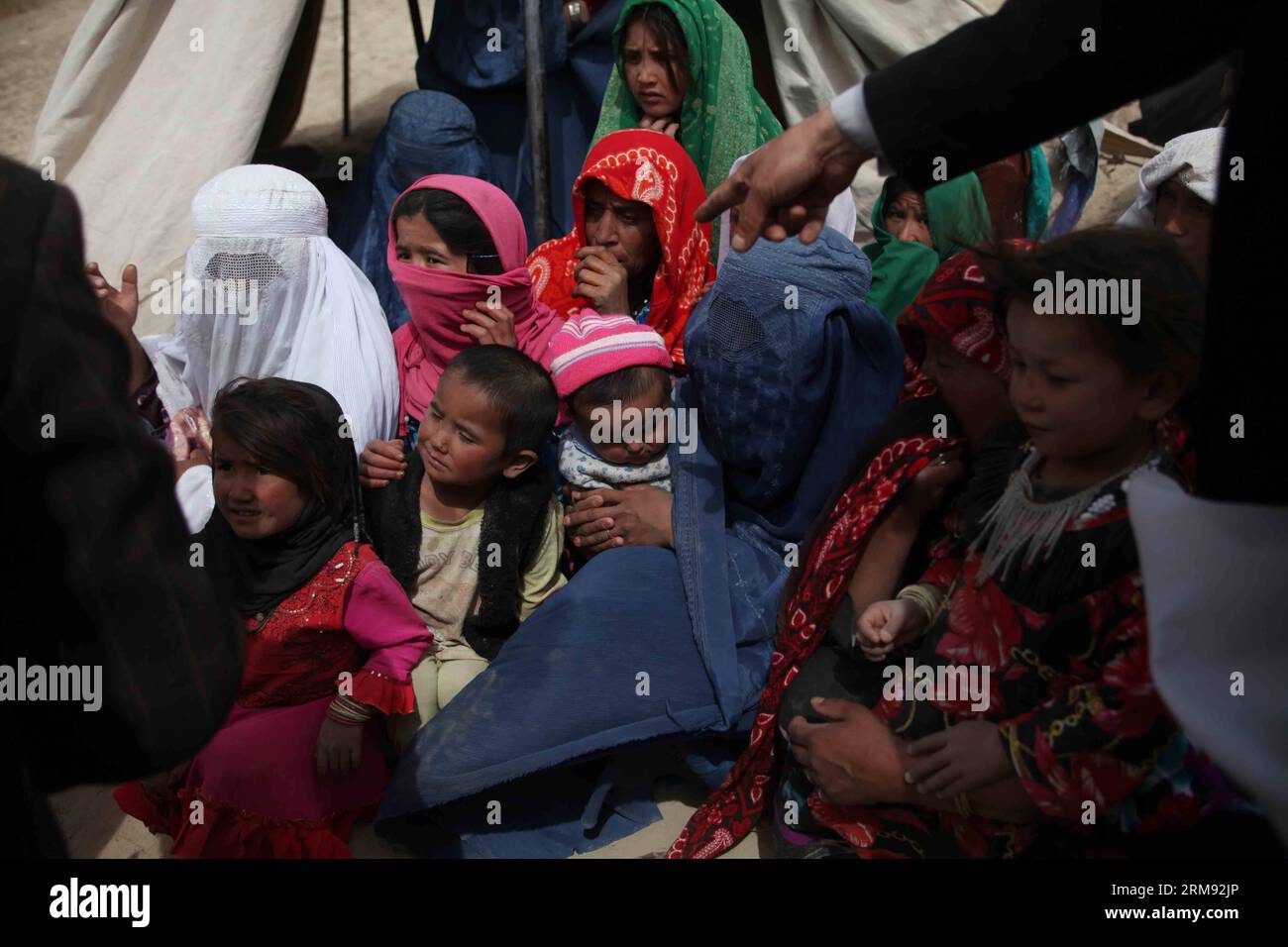 (140505) -- BADAKHSHAN, May 4, 2014 (Xinhua) -- Afghan women with their children wait to receive relief food after landside in Badakhshan province, northern Afghanistan, May 4, 2014. The deadly landslide occurred Friday in the mountainous province of Badakhshan. Although there is no official death toll, provincial governor Shah Waliullah Adeeb told Xinhua that more than 2,500 people might have lost their lives. (Xinhua/Ahmad Massoud) AFGHANISTAN-BADAKHSHAN-LANDSLIDE PUBLICATIONxNOTxINxCHN   Badakhshan May 4 2014 XINHUA Afghan Women With their Children Wait to receive Relief Food After Landside Stock Photo