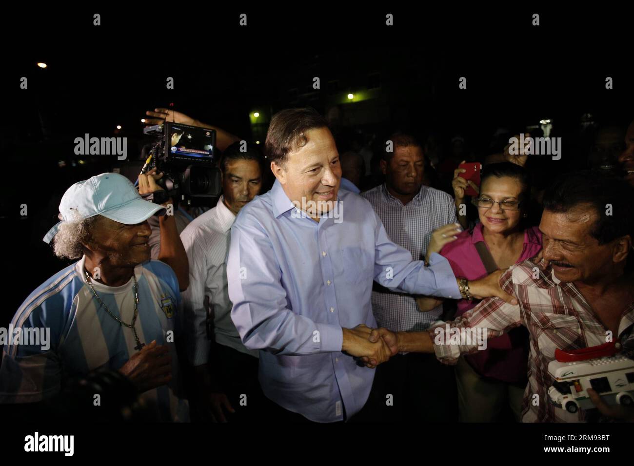PANAMA CITY, May 5, 2014 (Xinhua) -- Panama s President-elect Juan Carlos Varela (C) greets his supporters upon his arrival at a mass in Panama City, capital of Panama, May 5, 2014. Juan Carlos Varela from the opposition Panamenista Party won the presidential election, Supreme Electoral Court President Erasmo Pinilla said on Sunday.(Xinhua/Mauricio Valenzuela)(zhf) PANAMA-PANAMA CITY-POLITICS-ELECTIONS-PRESIDENT PUBLICATIONxNOTxINxCHN   Panama City May 5 2014 XINHUA Panama S President elect Juan Carlos Varela C greets His Supporters UPON His Arrival AT a Mass in Panama City Capital of Panama M Stock Photo