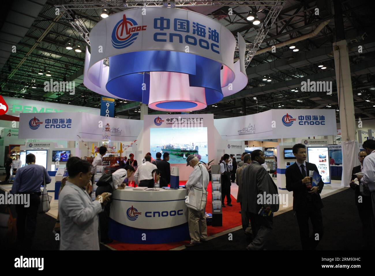 HOUSTON, May 5, 2014 (Xinhua) -- People visit the booth of China National Offshore Oil Corp. (CNOOC) at the Offshore Technology Conference (OTC) in Houston, the United States, May 5, 2014. More than 2,000 campanies from nearly 100 countries and regions participated in this 4-day conference which kicked off on May 5. (Xinhua/Song Qiong) (zhf) US-HOUSTON-OFFSHORE TECHNOLOGY CONFERENCE PUBLICATIONxNOTxINxCHN   Houston May 5 2014 XINHUA Celebrities Visit The Booth of China National Offshore Oil Corp CNOOC AT The Offshore Technology Conference OTC in Houston The United States May 5 2014 More than 2 Stock Photo