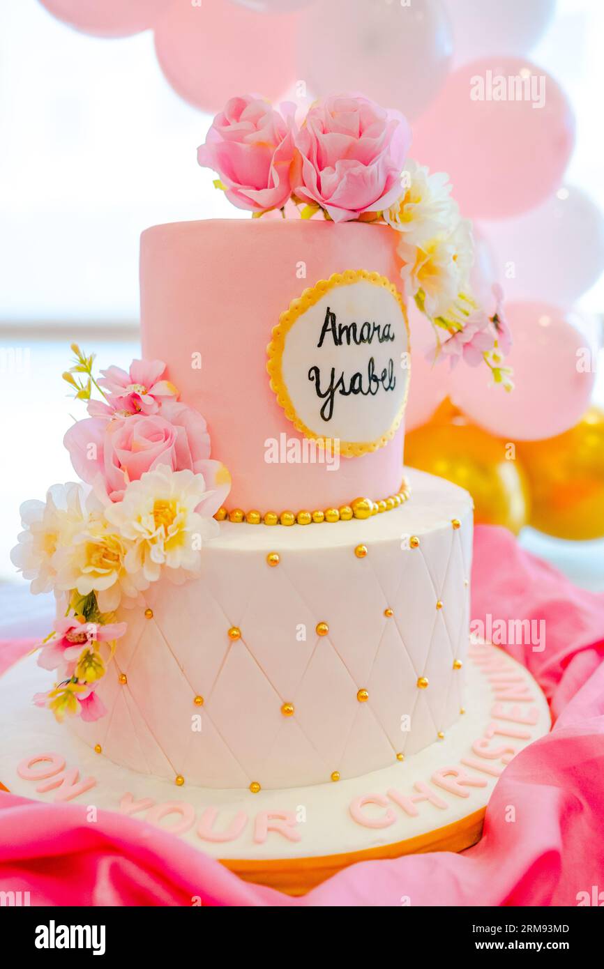 Made to order layered Christening cake to celebrate Stock Photo Alamy