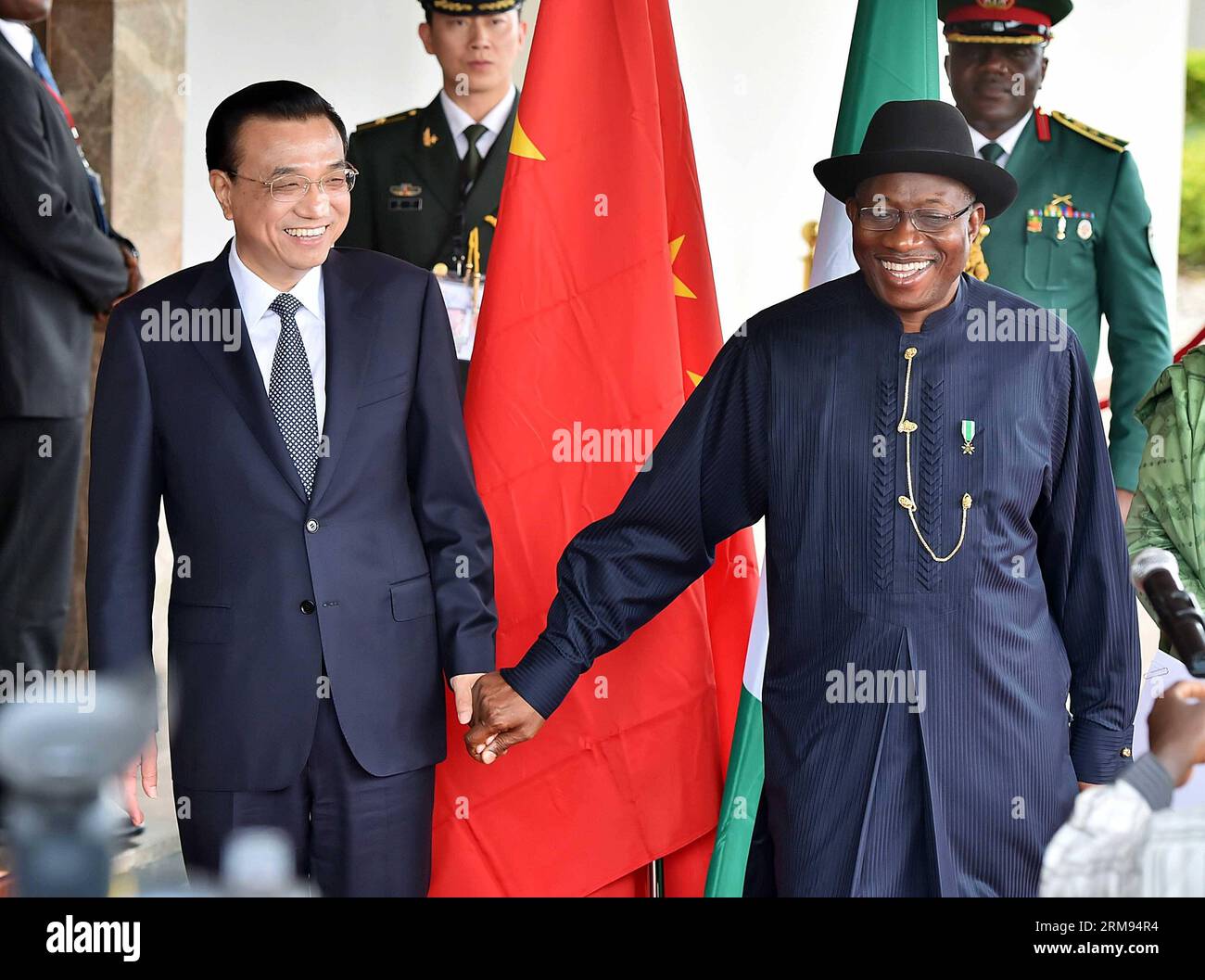 (140507) -- ABUJA, May 7, 2014 (Xinhua) -- Chinese Premier Li Keqiang (L) and Nigerian President Goodluck Jonathan attend a press conference after their talks in Abuja, Nigeria, May 7, 2014. (Xinhua/Li Tao) (mp) NIGERIA-CHINA-LI KEQIANG-GOODLUCK JONATHAN-PRESS CONFERENCE PUBLICATIONxNOTxINxCHN   Abuja May 7 2014 XINHUA Chinese Premier left Keqiang l and Nigerian President Goodluck Jonathan attend a Press Conference After their Talks in Abuja Nigeria May 7 2014 XINHUA left Tao MP Nigeria China left Keqiang Goodluck Jonathan Press Conference PUBLICATIONxNOTxINxCHN Stock Photo
