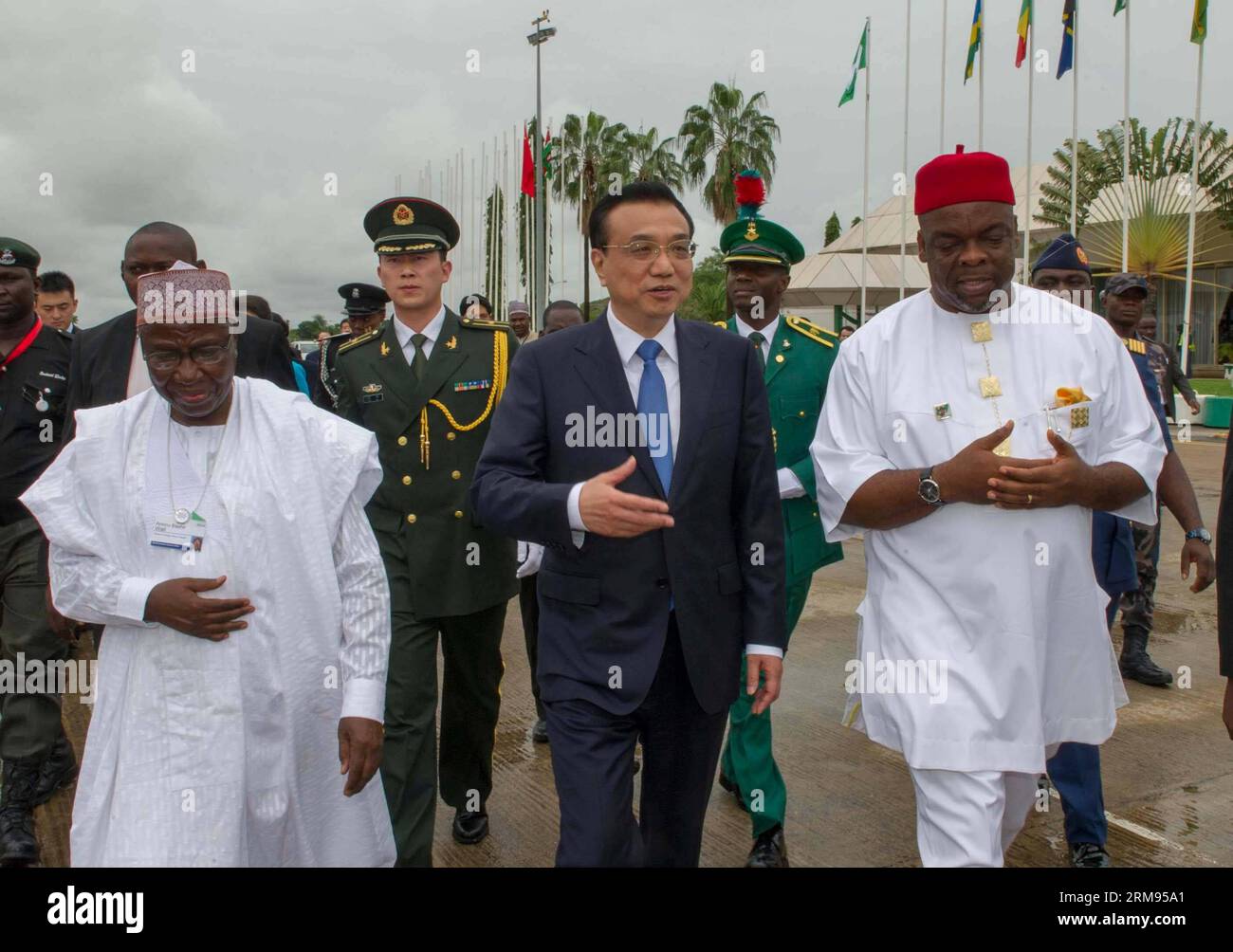 (140508) -- ABUJA, May 8, 2014 (Xinhua) -- Chinese Premier Li Keqiang (C) is accompanied by Nigerian Foreign Minister Aminu Bashir Wali (front L) and Minister of Labour and Productivity Chief Emeka Wogu (front R) at the airport in Abuja, Nigeria, May 8, 2014. Li concluded his visit to Nigeria on Thursday. (Xinhua/Xie Huanchi) (zkr) NIGERIA-CHINA-LI KEQIANG-DEPARTURE PUBLICATIONxNOTxINxCHN   Abuja May 8 2014 XINHUA Chinese Premier left Keqiang C IS accompanied by Nigerian Foreign Ministers Aminu Bashir Wali Front l and Ministers of Labour and Productivity Chief Emeka  Front r AT The Airport in Stock Photo