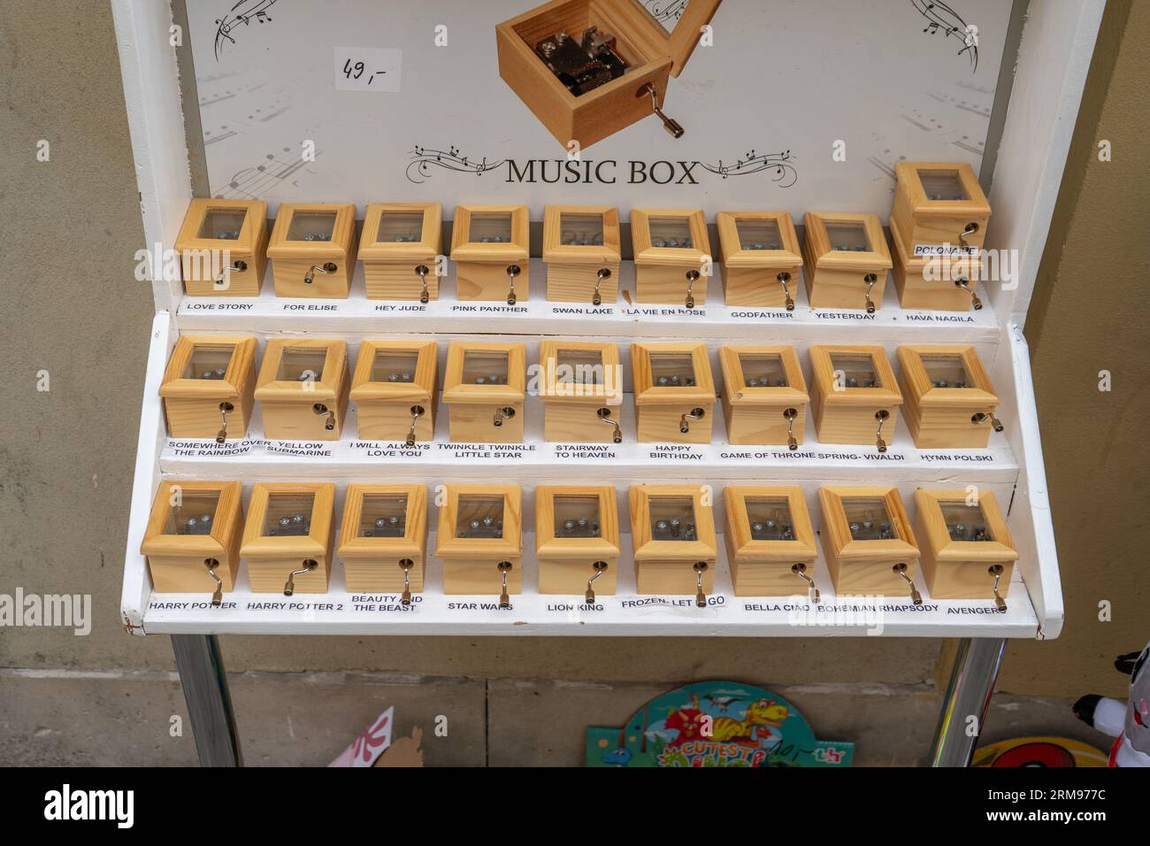 Set of different music boxes. A small wooden box winds up and plays a