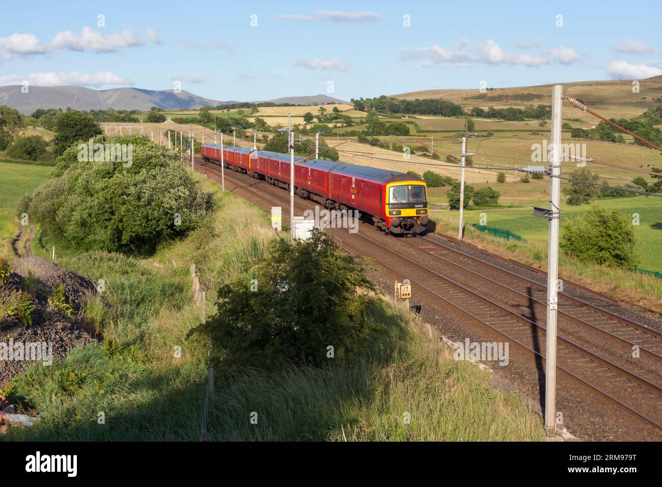 Royal Mail class 325 freight multiple units on the west coast mainline in Cumbria with Shieldmuir to Warrington working Stock Photo