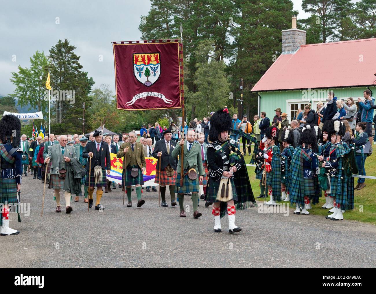 Official opening with marching band of the Braemar Gathering, Highland Games, Scottish Highlands Stock Photo