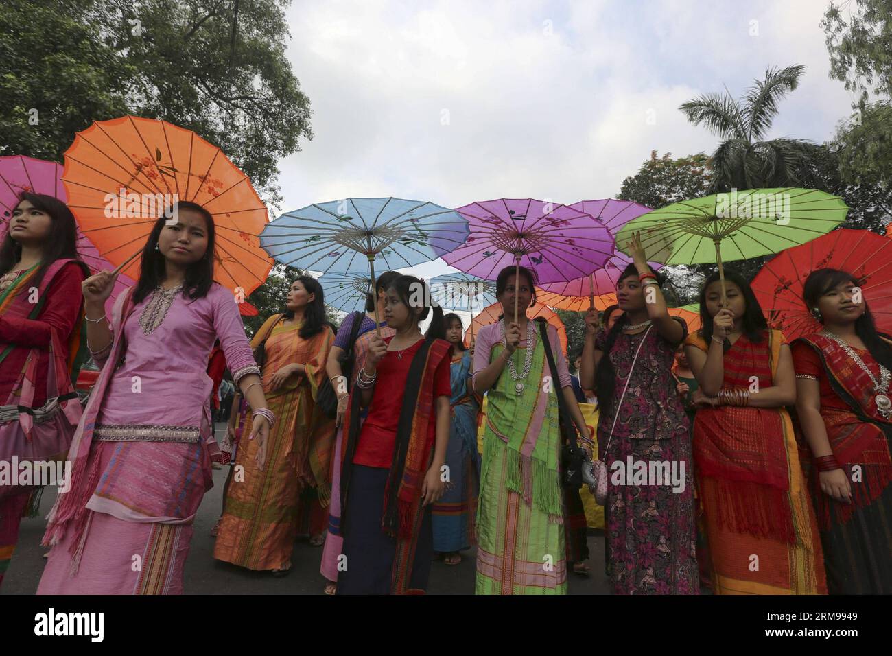 (140513) -- DHAKA, May 13, 2014 (Xinhua) -- Bangladeshi Buddhist devotees take part in a rally during the Buddha Purnima Festival in Dhaka, Bangladesh, May 13, 2014. Buddha Purnima, which marks the birth, enlightenment and passing away of Buddha is widely celebrated among Buddhists in the predominantly Muslim country. (Xinhua/Shariful Islam) BANGLADESH-DHAKA-FESTIVAL PUBLICATIONxNOTxINxCHN   Dhaka May 13 2014 XINHUA Bangladeshi Buddhist devotees Take Part in a Rally during The Buddha PURNIMA Festival in Dhaka Bangladesh May 13 2014 Buddha PURNIMA Which Marks The Birth enlightenment and passing Stock Photo