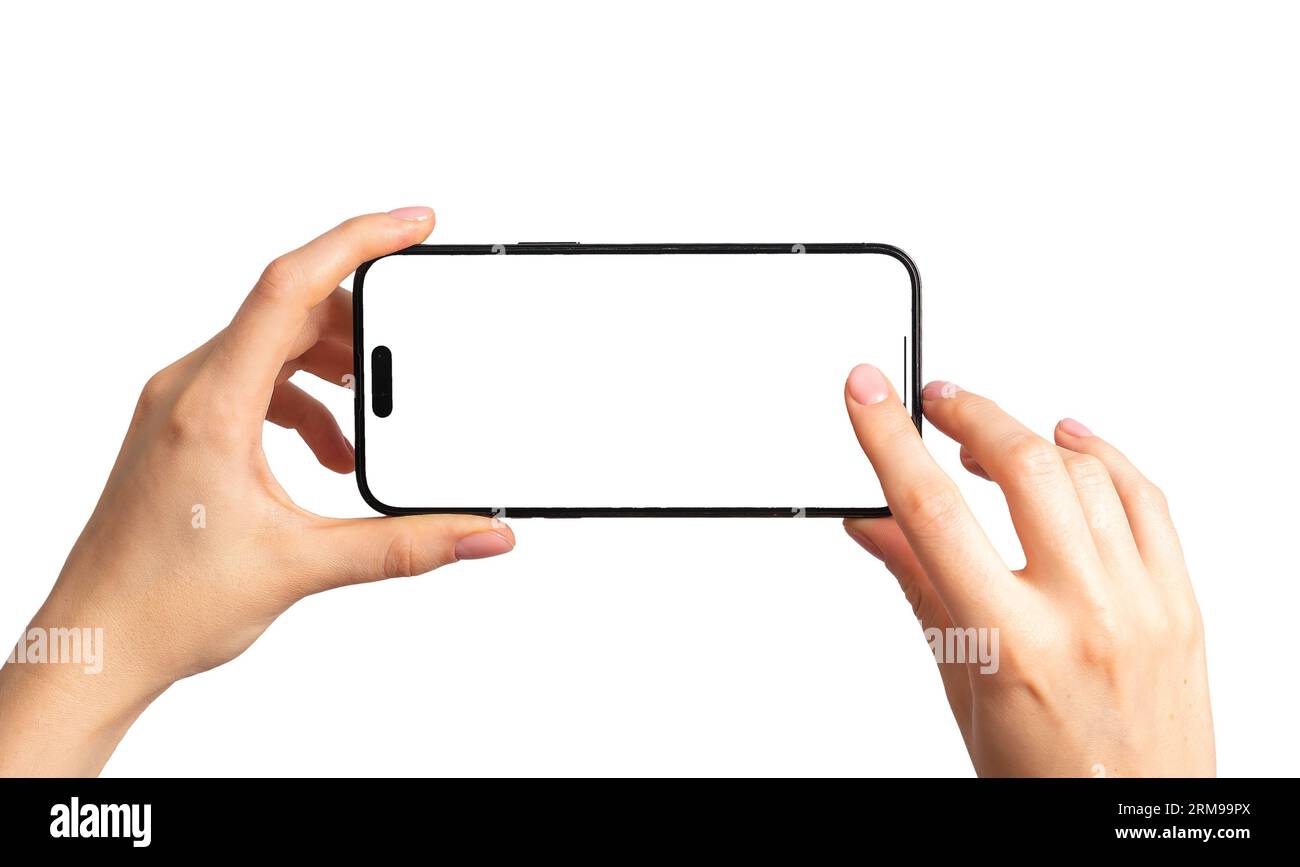 Finger tapping on mobile phone screen button, taking horizontal video, photo. Hand holding smartphone mockup horizontally, isolated on white backgroun Stock Photo