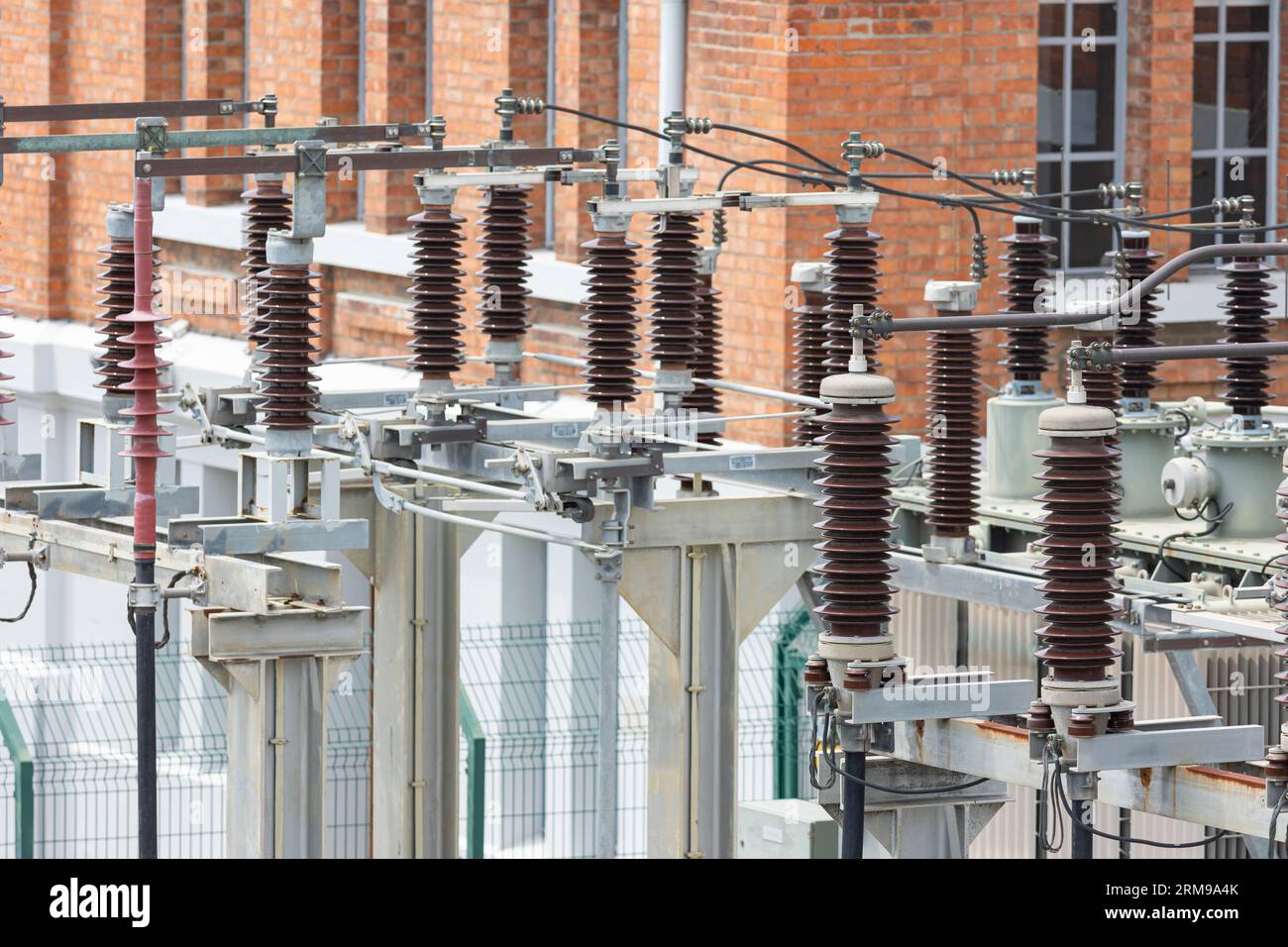 Voltage transformer on the roof of a building. Mid shot Stock Photo - Alamy