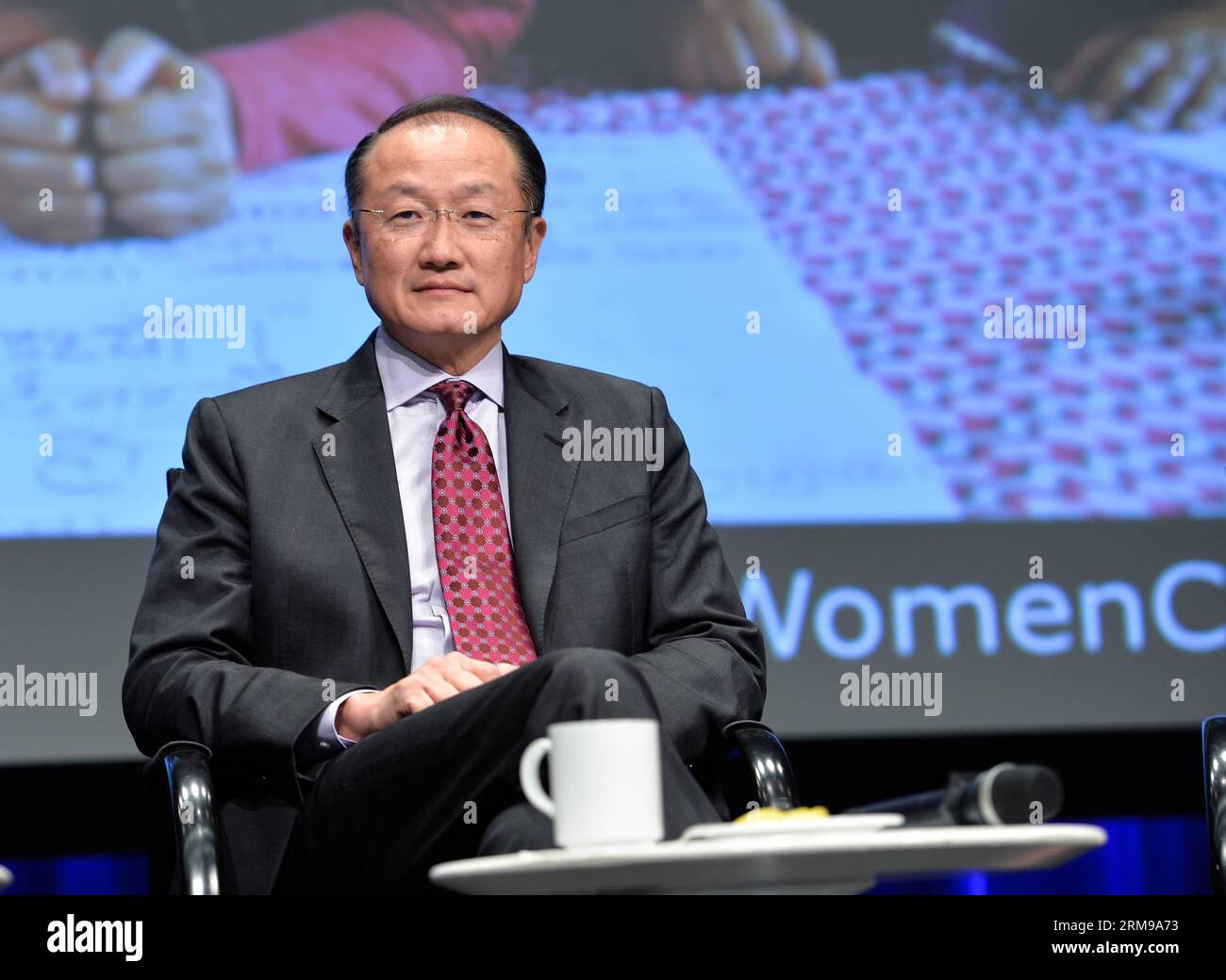 WASHINGTON D.C., May 14, 2014 - World Bank Group President Jim Yong Kim attends the launch ceremony of World Bank Group s new report Voice and Agency: Empowering Women and Girls for Shared Prosperity finds in Washington D.C., capital of the United States, May 14, 2014. Girls with little or no education are far more likely to be married as children, suffer domestic violence, live in poverty, and lack a say over household spending or their own health care than better-educated peers, according to the new report by the World Bank Group on Wednesday. (Xinhua/Bao Dandan) US-WASHINGTON-WORLD BANK-REP Stock Photo