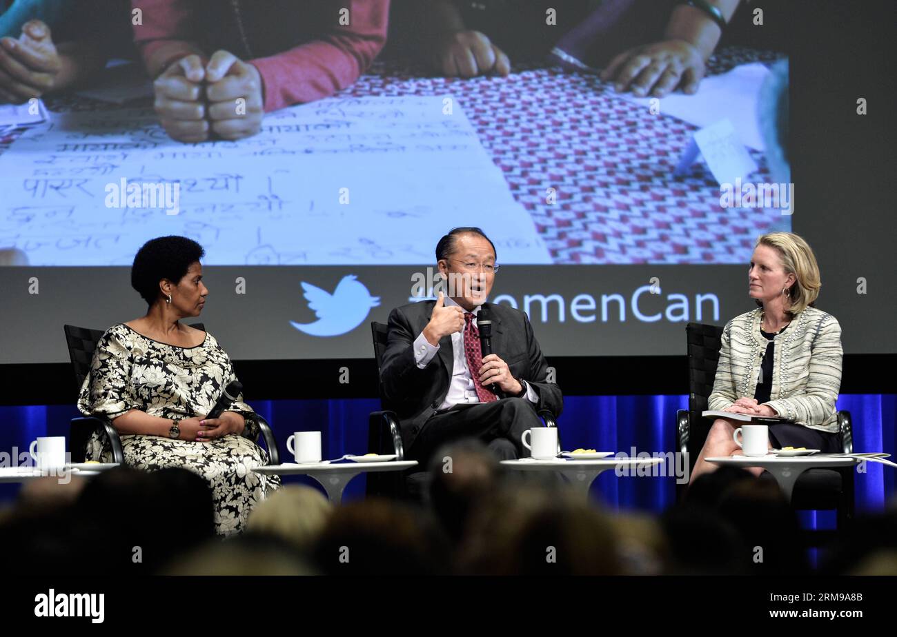 WASHINGTON D.C., May 14, 2014 - World Bank Group President Jim Yong Kim (C) speaks at the launch ceremony of World Bank Group s new report Voice and Agency: Empowering Women and Girls for Shared Prosperity finds in Washington D.C., capital of the United States, May 14, 2014. Girls with little or no education are far more likely to be married as children, suffer domestic violence, live in poverty, and lack a say over household spending or their own health care than better-educated peers, according to the new report by the World Bank Group on Wednesday. (Xinhua/Bao Dandan) US-WASHINGTON-WORLD BA Stock Photo