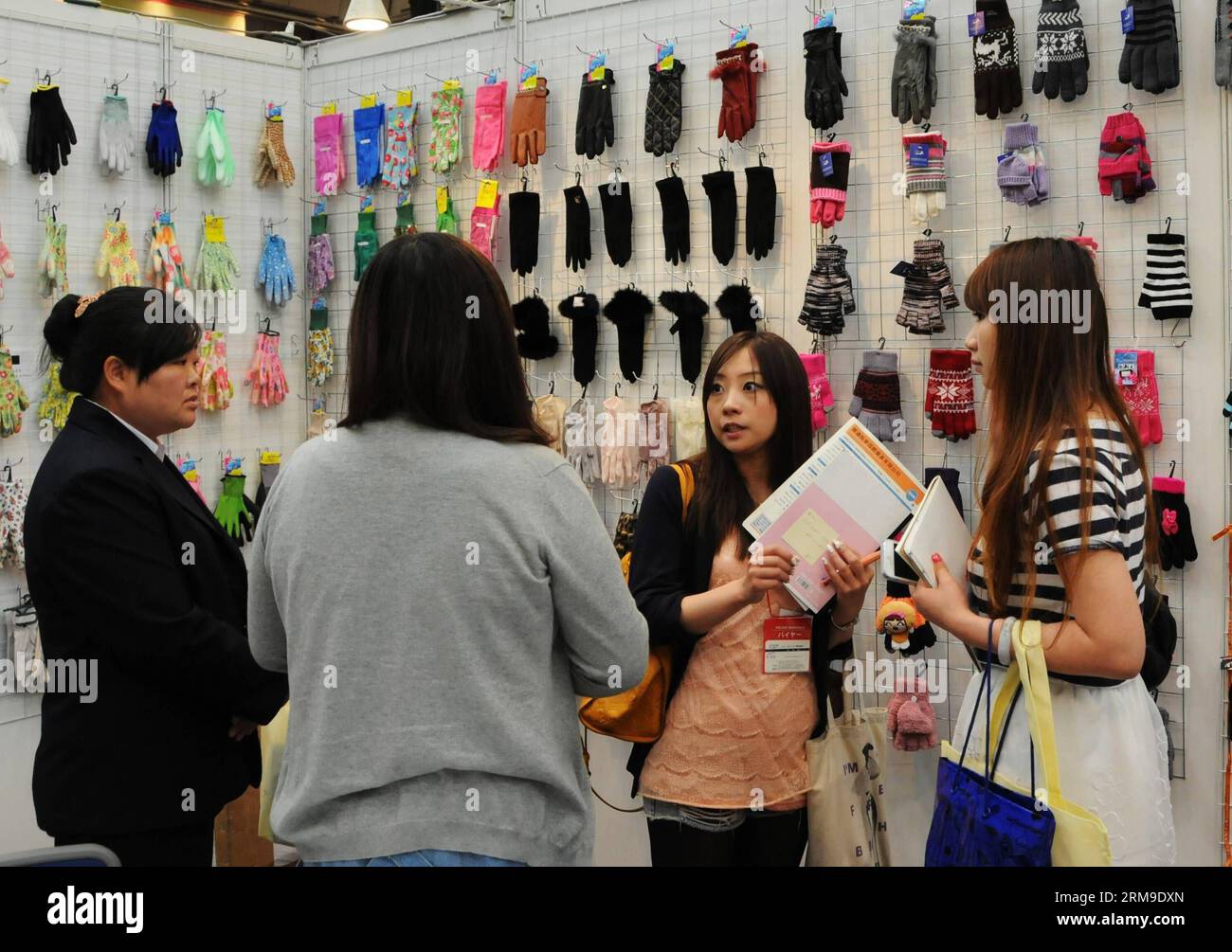 (140520) -- OSAKA, May 20, 2014 (Xinhua) -- Clients visit the 18th China Jiangsu Commodities Exhibition in Osaka, Japan, May 20, 2014. The 3-day event opened here Tuesday. The exhibition displayed products including clothes, home fabrics and handicrafts, attracting about 170 firms from Jiangsu Province in east China. (Xinhua/Ma Xinghua) (dzl) JAPAN-OSAKA-CHINA-COMMODITIES EXHIBITION PUBLICATIONxNOTxINxCHN   Osaka May 20 2014 XINHUA clients Visit The 18th China Jiangsu Commodities Exhibition in Osaka Japan May 20 2014 The 3 Day Event opened Here Tuesday The Exhibition displayed Products includi Stock Photo