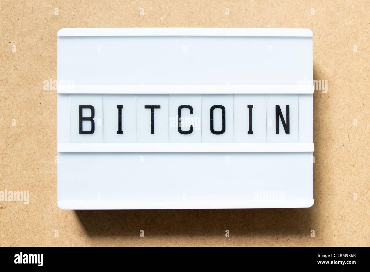 Lightbox with word bitcoin on wood background Stock Photo