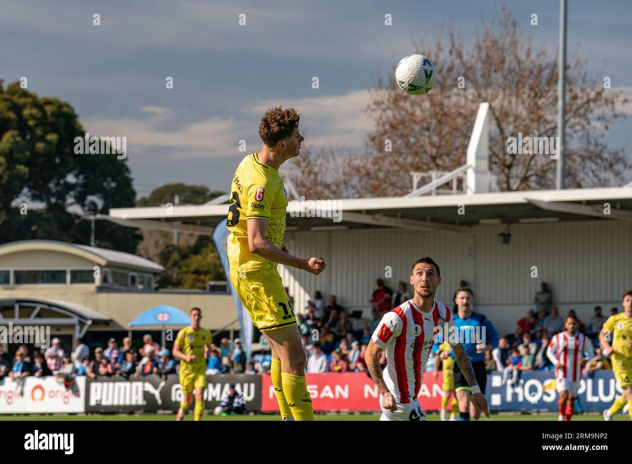 Oakleigh, Australia. 27 August, 2023. Welling Phoenix player Lukas Kelly-Heald deaders the ball forward from a wing position. Credit: James Forrester/Alamy Live News Stock Photo