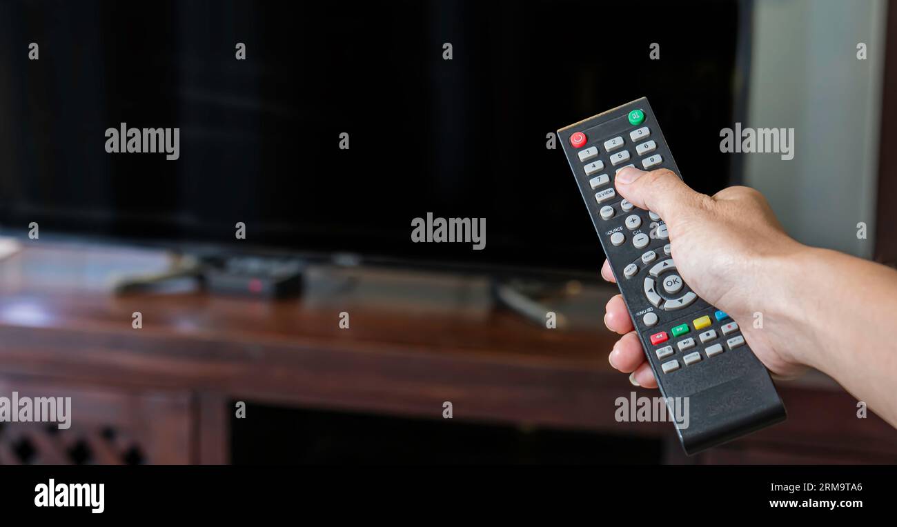 Television hand hi-res stock photography and images - Alamy