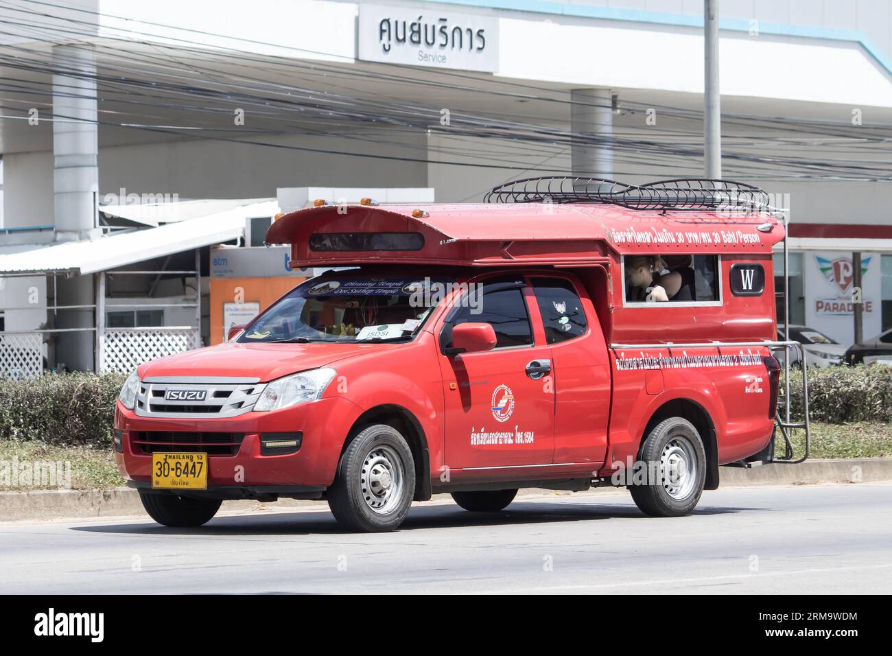 Chiangmai, Thailand -  July  14 2023: Red taxi chiang mai. Service in city and around. On road no.1001 8 km from Chiangmai Business Area. Stock Photo