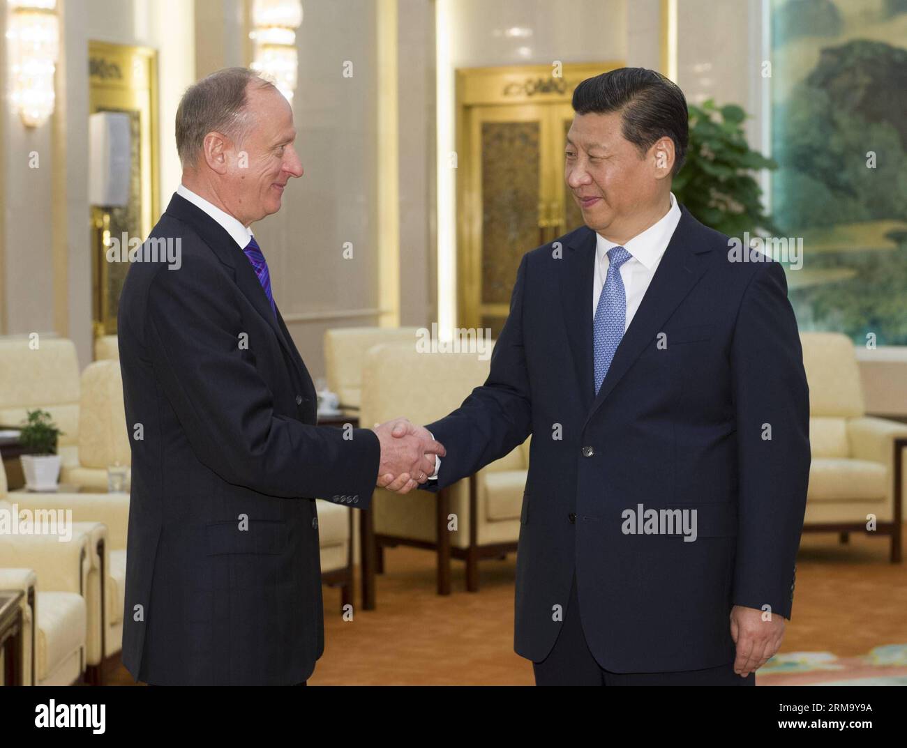 (140606) -- BEIJING, June 6, 2014 (Xinhua) -- Chinese President Xi Jinping (R) meets with Russian Security Council Secretary Nikolai Patrushev in Beijing, capital of China, June 6, 2014. Nikolai Patrushev was here to attend the first meeting of China-Russia institutionalized cooperation in law enforcement and security and the 10th round of China-Russia strategic security consultation. (Xinhua/Xie Huanchi) (mp) CHINA-BEIJING-XI JINPING-RUSSIA-SECURITY COUNCIL SECRETARY-MEETING (CN) PUBLICATIONxNOTxINxCHN   Beijing June 6 2014 XINHUA Chinese President Xi Jinping r Meets With Russian Security Cou Stock Photo
