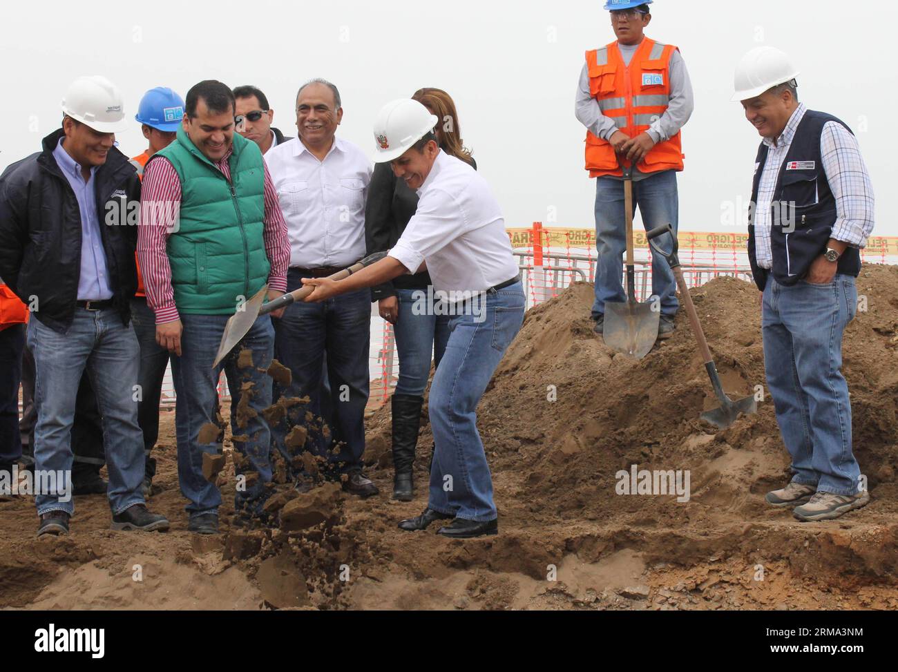 CALLAO, June 14, 2014 (Xinhua) -- President of Peru Ollanta Humala (C) takes part in the ceremony of the start of works of expansion and improvement system of drinking water and sewer for the Pachacutec Macro Project , in the district of Ventanilla, Constitutional of Callao Province, department of Lima, Peru, on June 14, 2014. The project will provide that more than 230,000 people to have drinking water and sewer in their homes, according to local press. (Xinhua/Luis Camacho) (jp) PERU-CALLAO-POLITICS-HUMALA PUBLICATIONxNOTxINxCHN   Callao June 14 2014 XINHUA President of Peru Ollanta Humala C Stock Photo