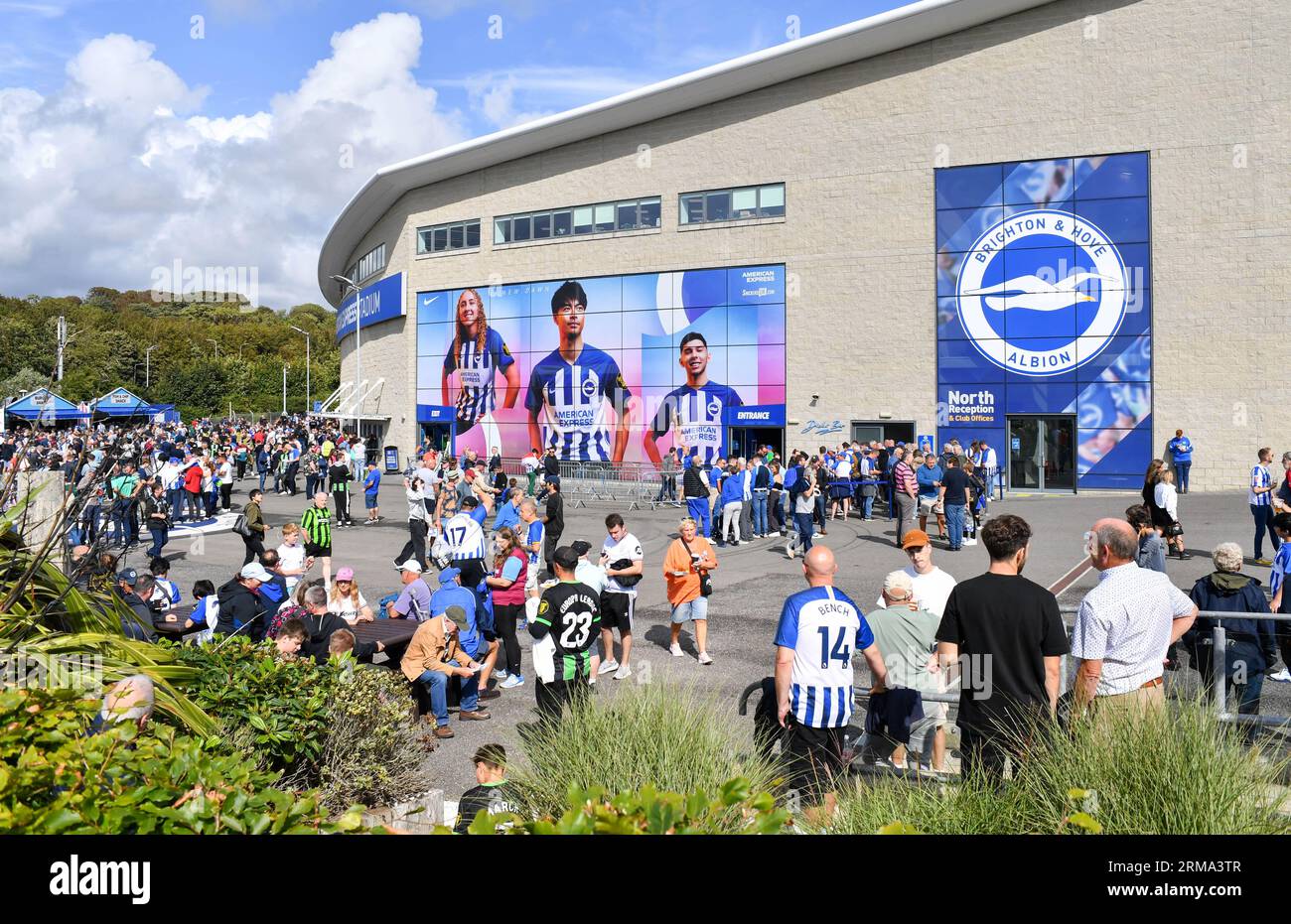 Fans arrive for the Premier League match between Brighton and Hove Albion and West Ham United at the American Express Stadium  , Brighton , UK - 26th August 2023. Photo Simon Dack / Telephoto Images Editorial use only. No merchandising. For Football images FA and Premier League restrictions apply inc. no internet/mobile usage without FAPL license - for details contact Football Dataco Stock Photo