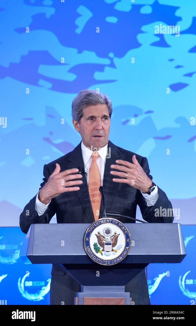(140617) -- Washington D.C., June 17, 2014 (Xinhua) -- U.S. Secretary of State John Kerry speaks during our ocean conference at the U.S. Department of State in Washington D.C., capital of the United States, June 17, 2014. U.S. President Barack Obama on Tuesday announced plans to create what could be the world s largest marine sanctuary in the south-central Pacific Ocean in an effort to protect the ocean and its marine ecosystems. Obama announced his executive actions in a video message to those present at the Our Ocean conference hosted by the U.S. State Department, which was focused on sustai Stock Photo