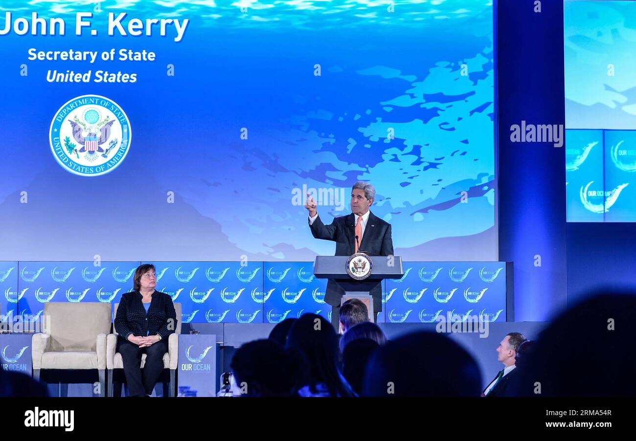 (140617) -- Washington D.C., June 17, 2014 (Xinhua) -- U.S. Secretary of State John Kerry speaks during our ocean conference at the U.S. Department of State in Washington D.C., capital of the United States, June 17, 2014. U.S. President Barack Obama on Tuesday announced plans to create what could be the world s largest marine sanctuary in the south-central Pacific Ocean in an effort to protect the ocean and its marine ecosystems. Obama announced his executive actions in a video message to those present at the Our Ocean conference hosted by the U.S. State Department, which was focused on sustai Stock Photo