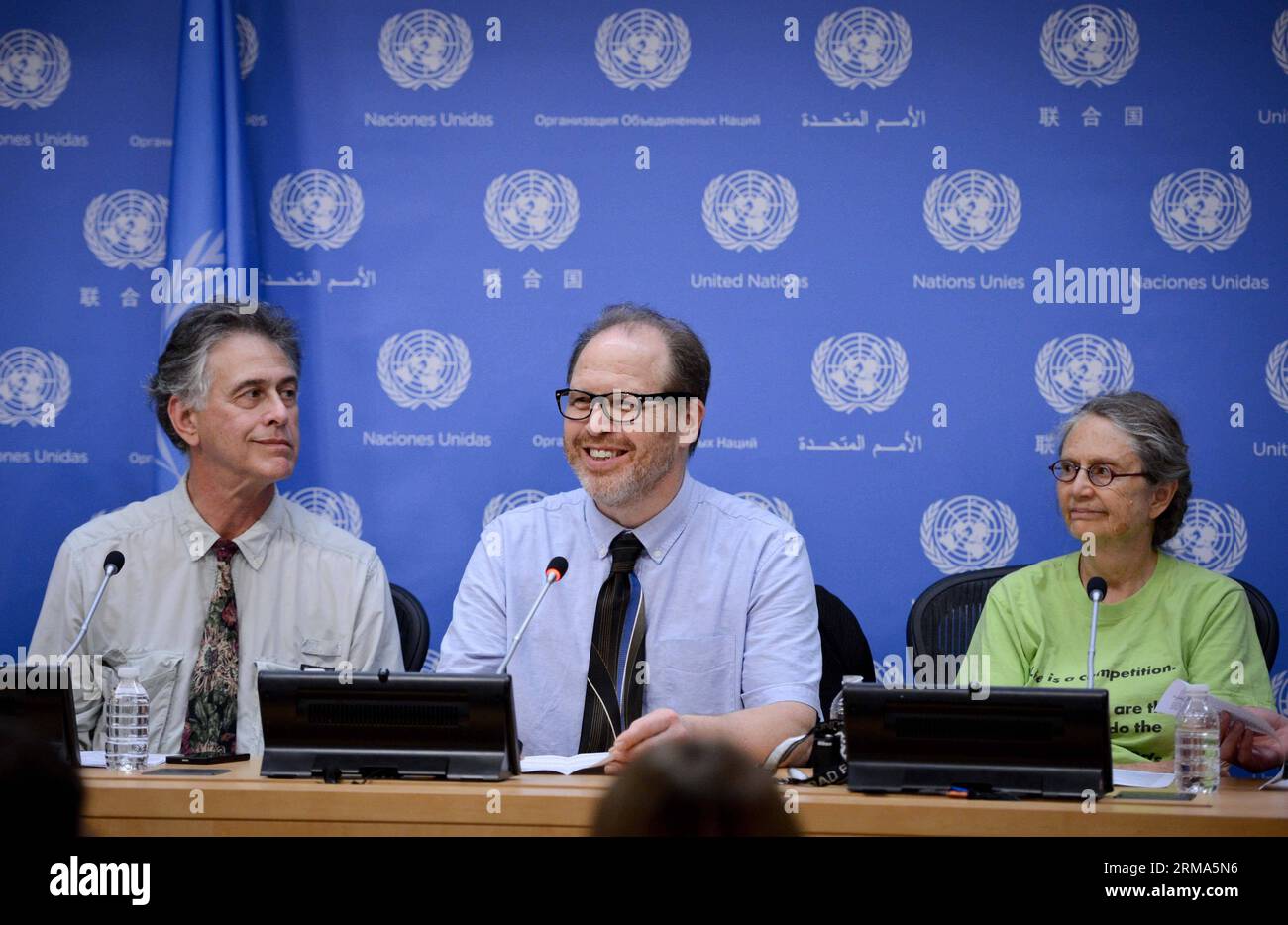 Antiwar activist Joe Losbaker (C), one of five US observers who monitored the Syrian presidential election, speaks during their joint press conference with Syrian Permanent Representative to the United Nations Bashar Ja afari (not in picture) at the UN headquarters in New York, on June 18, 2014. (Xinhua/Niu Xiaolei) UN-NEW YORK-SYRIA-ELECTION-OBSERVERS PUBLICATIONxNOTxINxCHN   Activist Joe  C One of Five U.S. OBSERVERS Who Monitored The Syrian Presidential ELECTION Speaks during their Joint Press Conference With Syrian permanently Representative to The United Nations Bashar Yes Afari Not in Pi Stock Photo