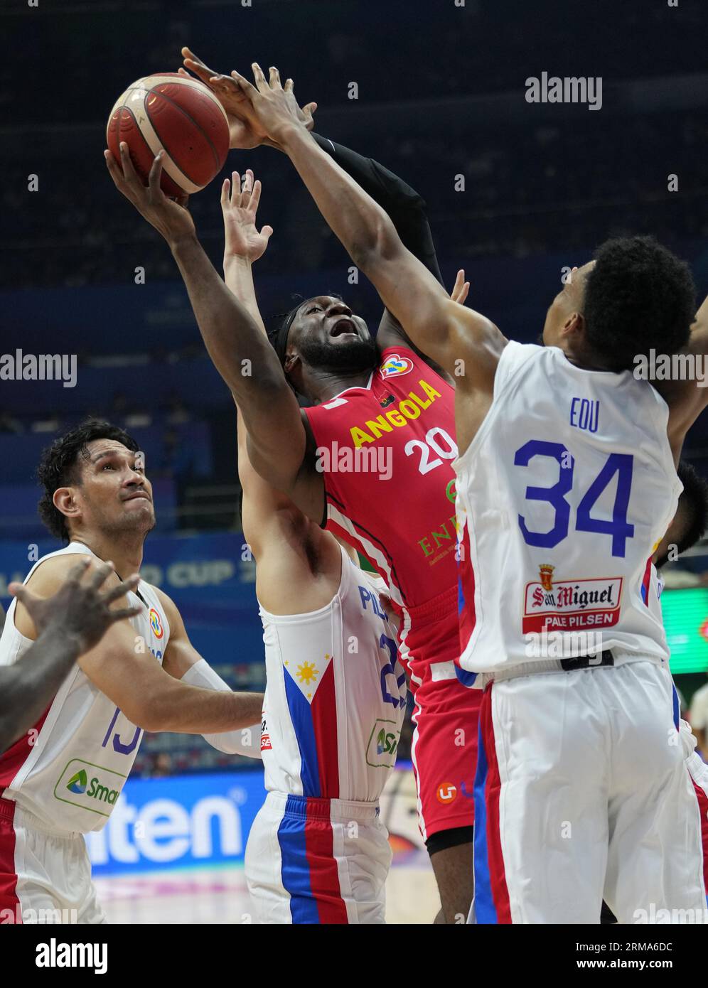 Manila, Philippines. 27th Aug, 2023. Bruno Fernando (2nd R) of Angola breaks through during the Group A match between the Philippines and Angola at the 2023 FIBA World Cup in Manila, the Philippines, on Aug. 27, 2023. Credit: Meng Yongmin/Xinhua/Alamy Live News Stock Photo