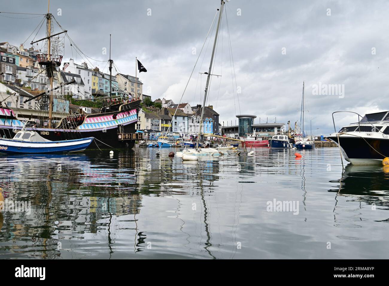 Brixham, UK. 27th Aug, 2023. 27th August/2023. A sailing Yacht is seen submerged underwater, Next to the Iconic Golden Hind replica ship. Picture Credit: Robert Timoney/Alamy Live News Stock Photo