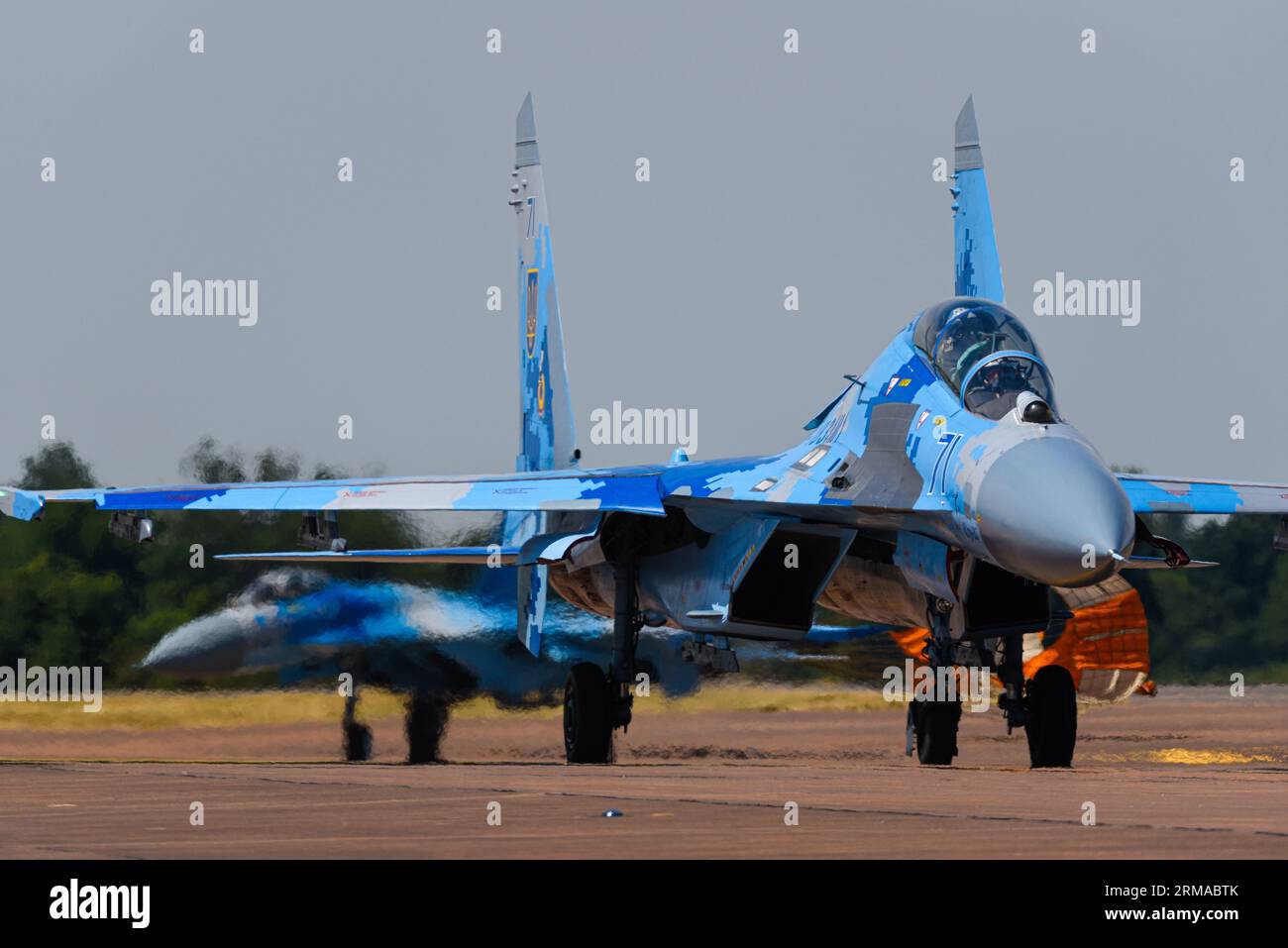 Ukrainian Air Force Sukhoi Su-27 Flanker fighter jet planes taxiing after landing at Royal International Air Tattoo, RIAT, RAF Fairford airshow, UK Stock Photo