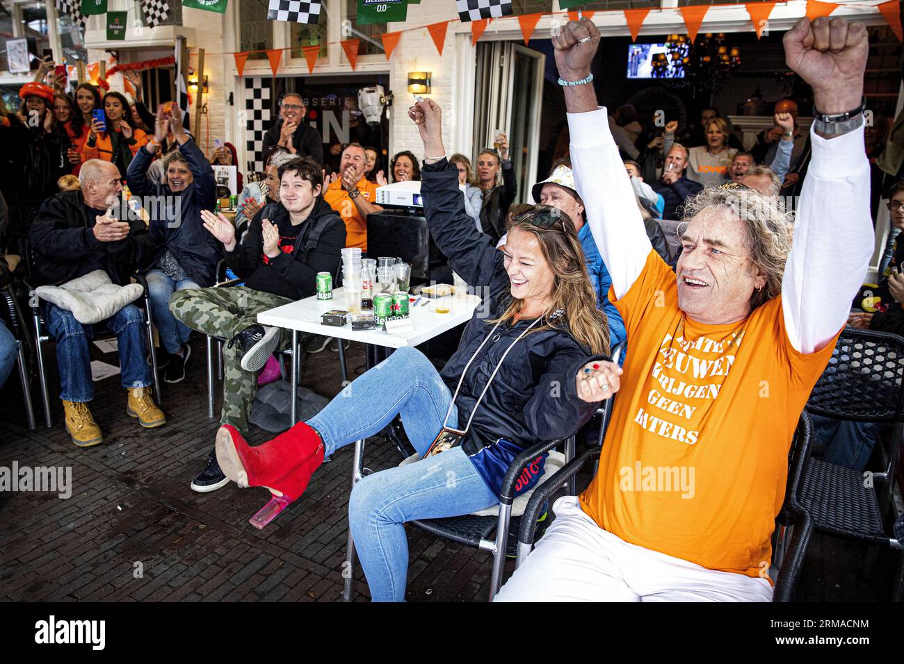 ZANDVOORT People cheer at a restaurant in the Haltestraat after Max