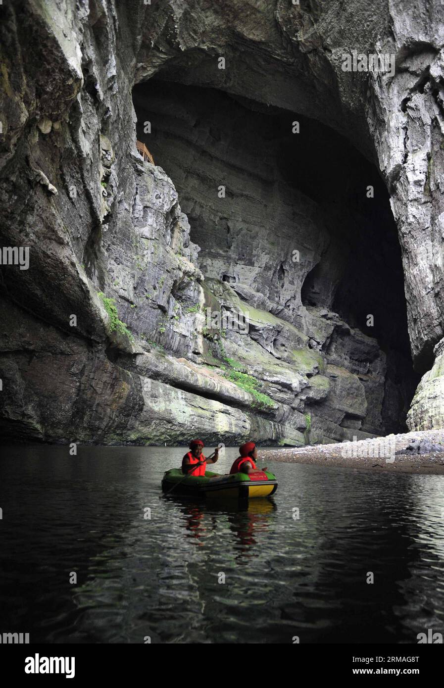 (140708) -- XIANFENG, July 8, 2014 (Xinhua) -- Tourists enjoy rafting in a cave within the Huangjindong Scenic Area in Xianfeng County, central China s Hubei Province, July 8, 2014. Many people sought refuge in whitewater rafting against the summer heat. (Xinhua/Yang Shunpi) (lmm) CHINA-SUMMER-LEISURE-RAFTING (CN) PUBLICATIONxNOTxINxCHN   Xian Feng July 8 2014 XINHUA tourists Enjoy Rafting in a Cave Within The  Scenic Area in Xian Feng County Central China S Hubei Province July 8 2014 MANY Celebrities sought Refuge in Whitewater Rafting against The Summer Heat XINHUA Yang Shunpi lmm China Summ Stock Photo