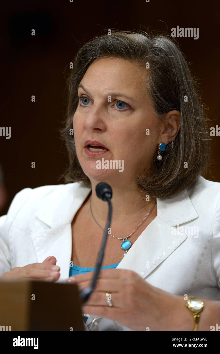 (140710) -- WASHINGTON D.C., July 9, 2014 (Xinhua) -- Assistant Secretary of State for European and Eurasian Affairs Victoria Nuland testifies before the Senate committee on foreign relations hearing to examine Russia and developments in Ukraine on Capitol Hill in Washington D.C., the United States, July 9, 2014. (Xinhua/Yin Bogu) (zjl) U.S.-WASHINGTON D.C.-SENATE-HEARING-UKRAINE PUBLICATIONxNOTxINxCHN   Washington D C July 9 2014 XINHUA Assistant Secretary of State for European and EURASIAN Affairs Victoria Nuland testifies Before The Senate Committee ON Foreign relations Hearing to examine R Stock Photo