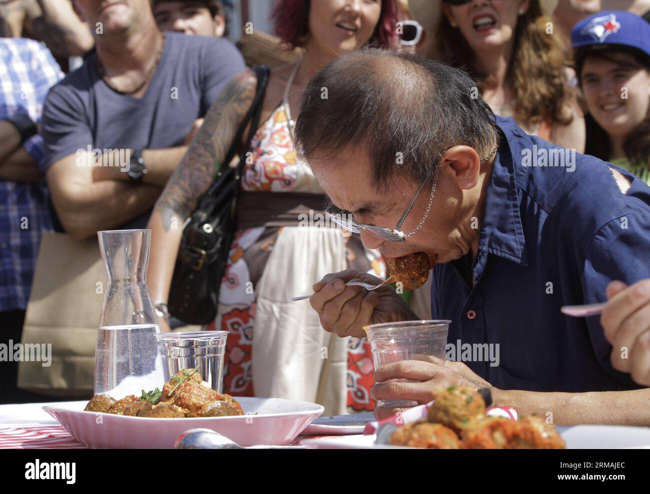 Spaghetti eating competition hi-res stock photography and images - Alamy