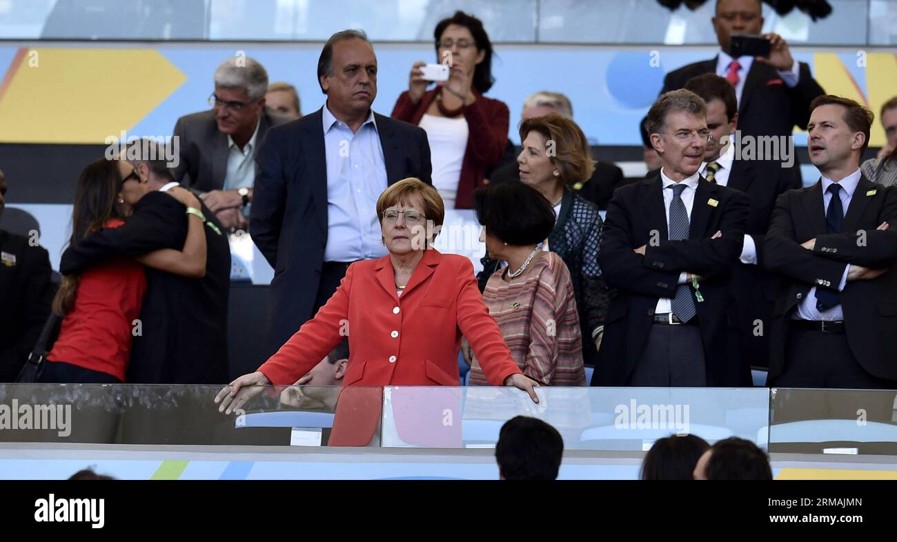 (140713) -- RIO DE JANEIRO, July 13, 2014 (Xinhua) -- German Chancellor Angela Merkel (front) watches the final match between Germany and Argentina of 2014 FIFA World Cup at the Estadio do Maracana Stadium in Rio de Janeiro, Brazil, on July 13, 2014. (Xinhua/Qi Heng)(pcy) (SP)BRAZIL-RIO DE JANEIRO-WORLD CUP 2014-FINAL-GERMANY VS ARGENTINA PUBLICATIONxNOTxINxCHN   Rio de Janeiro July 13 2014 XINHUA German Chancellor Angela Merkel Front Watches The Final Match between Germany and Argentina of 2014 FIFA World Cup AT The Estadio Do Maracana Stage in Rio de Janeiro Brazil ON July 13 2014 XINHUA Qi Stock Photo