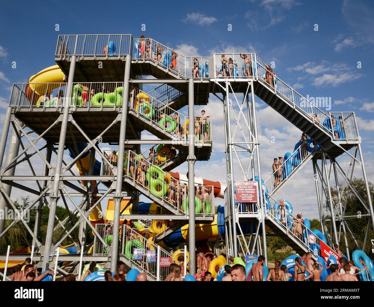 People wait in queues for Waterpark slides. Atlantic Toboggan, Vendée, France Stock Photo