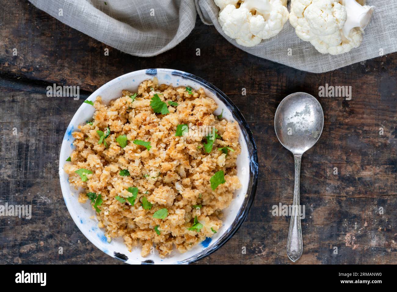 Spiced cauliflower rice with fresh coriander overhead view Stock Photo Alamy