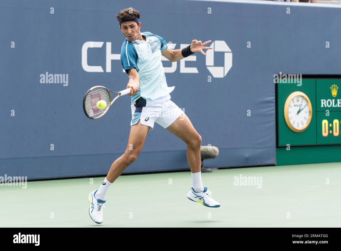Emilio Nava of USA returns ball during final round match against Eliot Spizzirri of USA of qualifying for US Open Championships at Billy Jean King Tennis Center in New York on August 24, 2023 Stock Photo