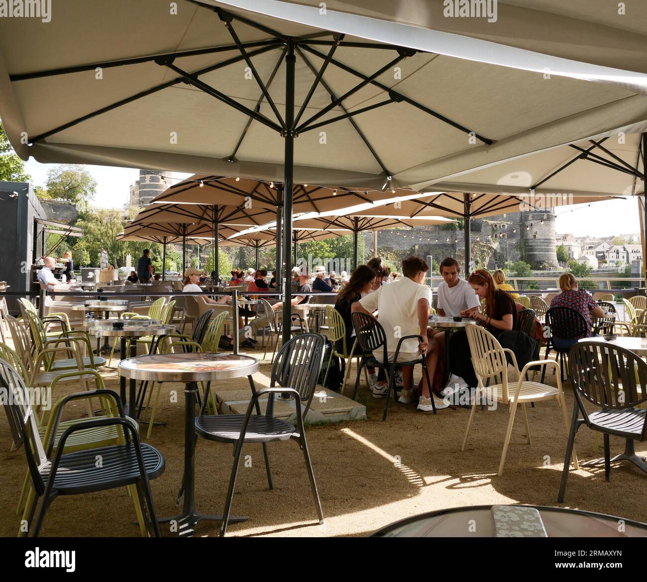 Riverside terrace cafe, Angers France Stock Photo